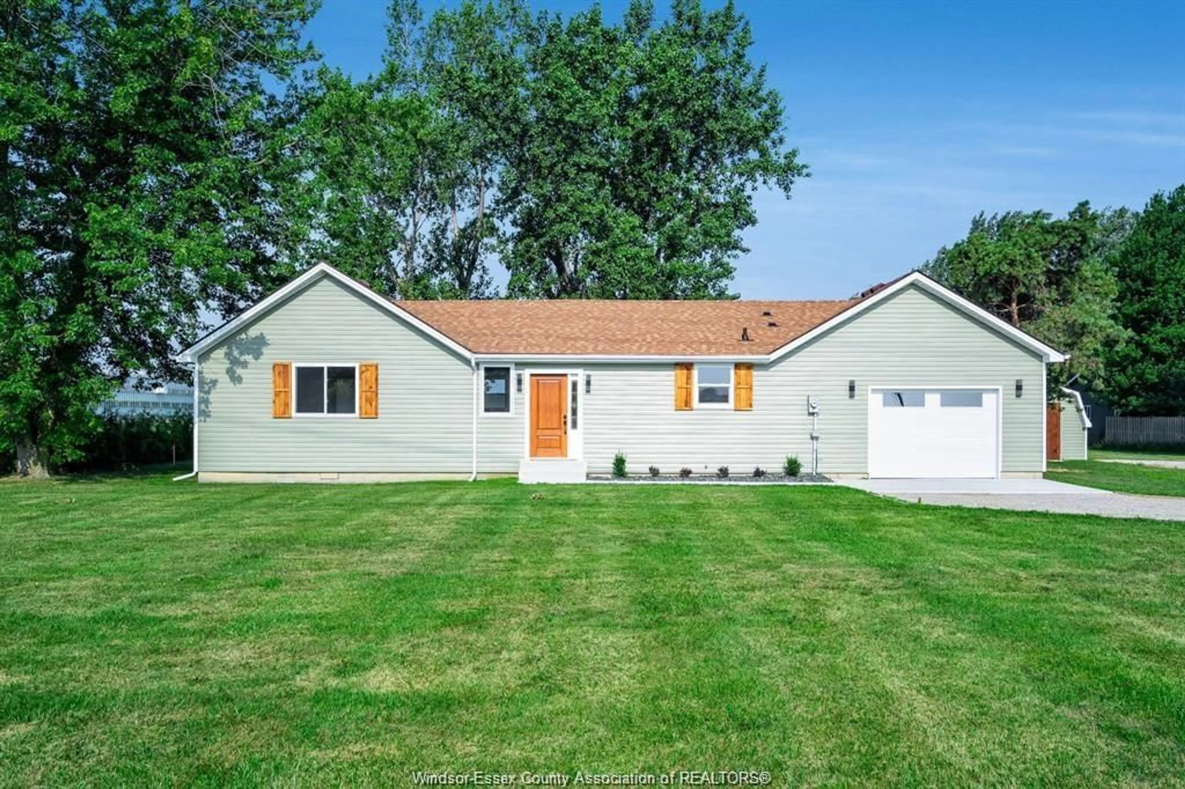 Home with vinyl exterior material, street for 1175 HIGHWAY 77, Leamington Ontario N8H 3V8