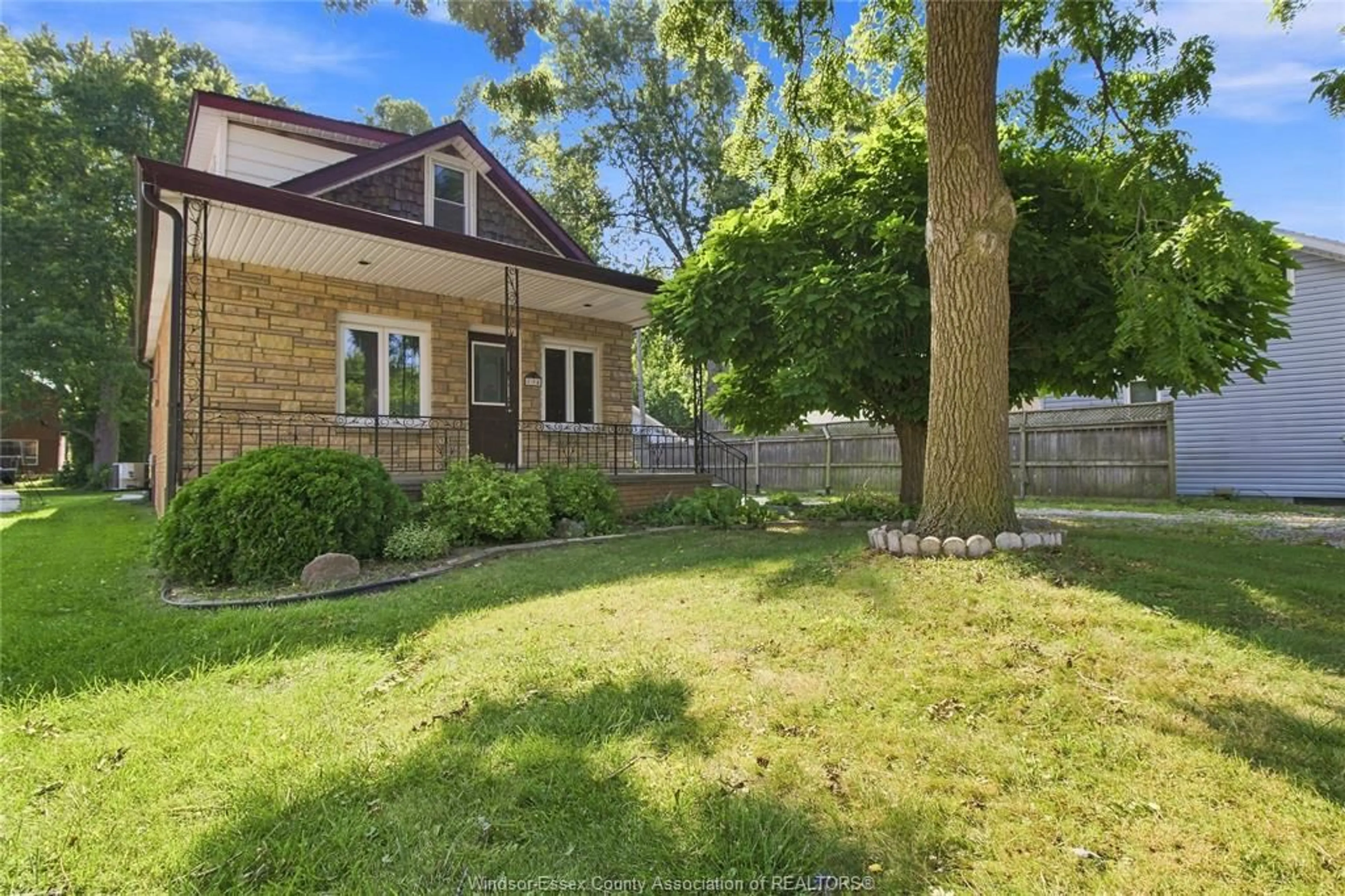 A pic from outside/outdoor area/front of a property/back of a property/a pic from drone, street for 134 ALEXANDER Ave, Lakeshore Ontario N0R 1A0