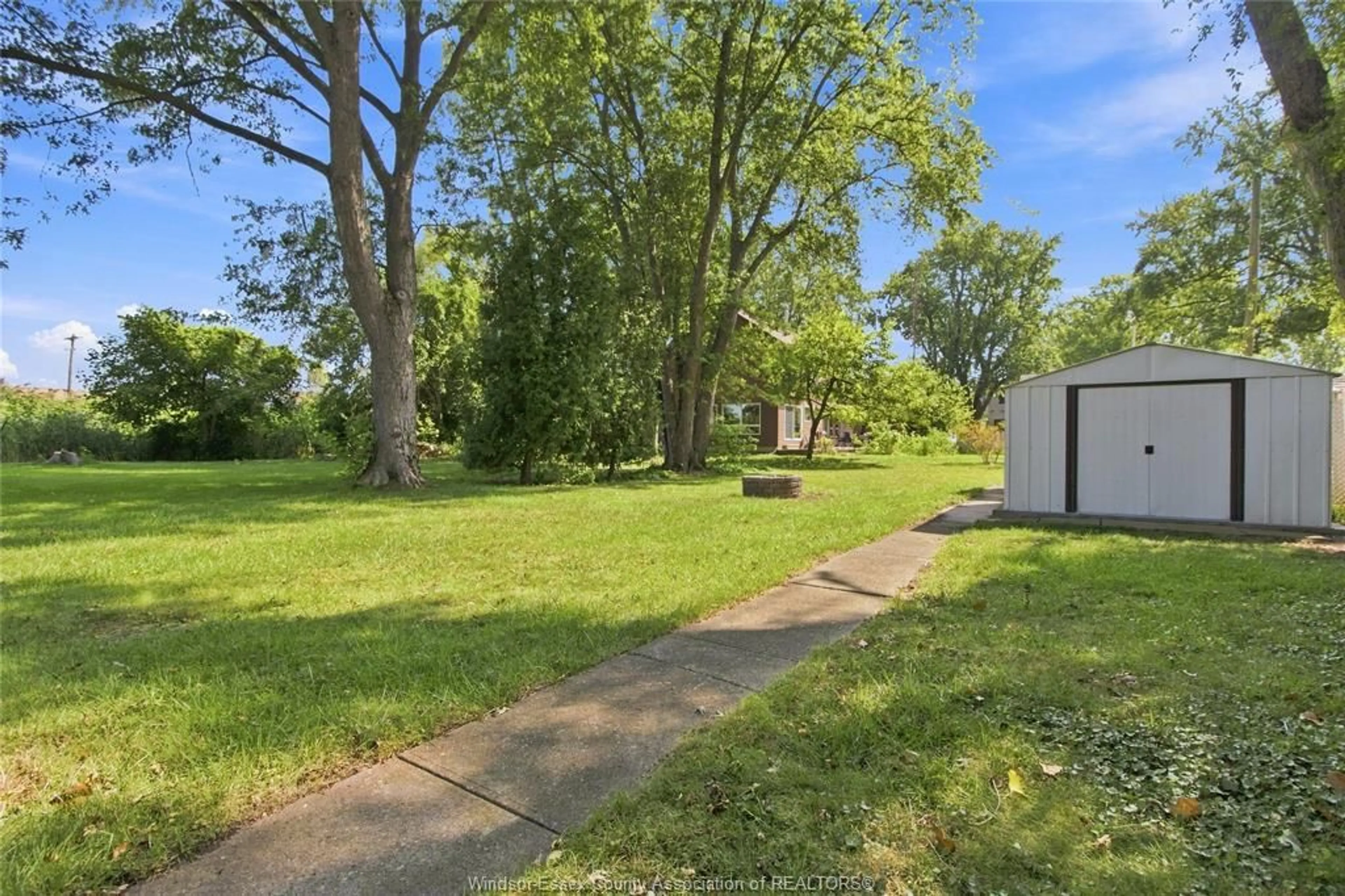 A pic from outside/outdoor area/front of a property/back of a property/a pic from drone, street for 134 ALEXANDER Ave, Lakeshore Ontario N0R 1A0
