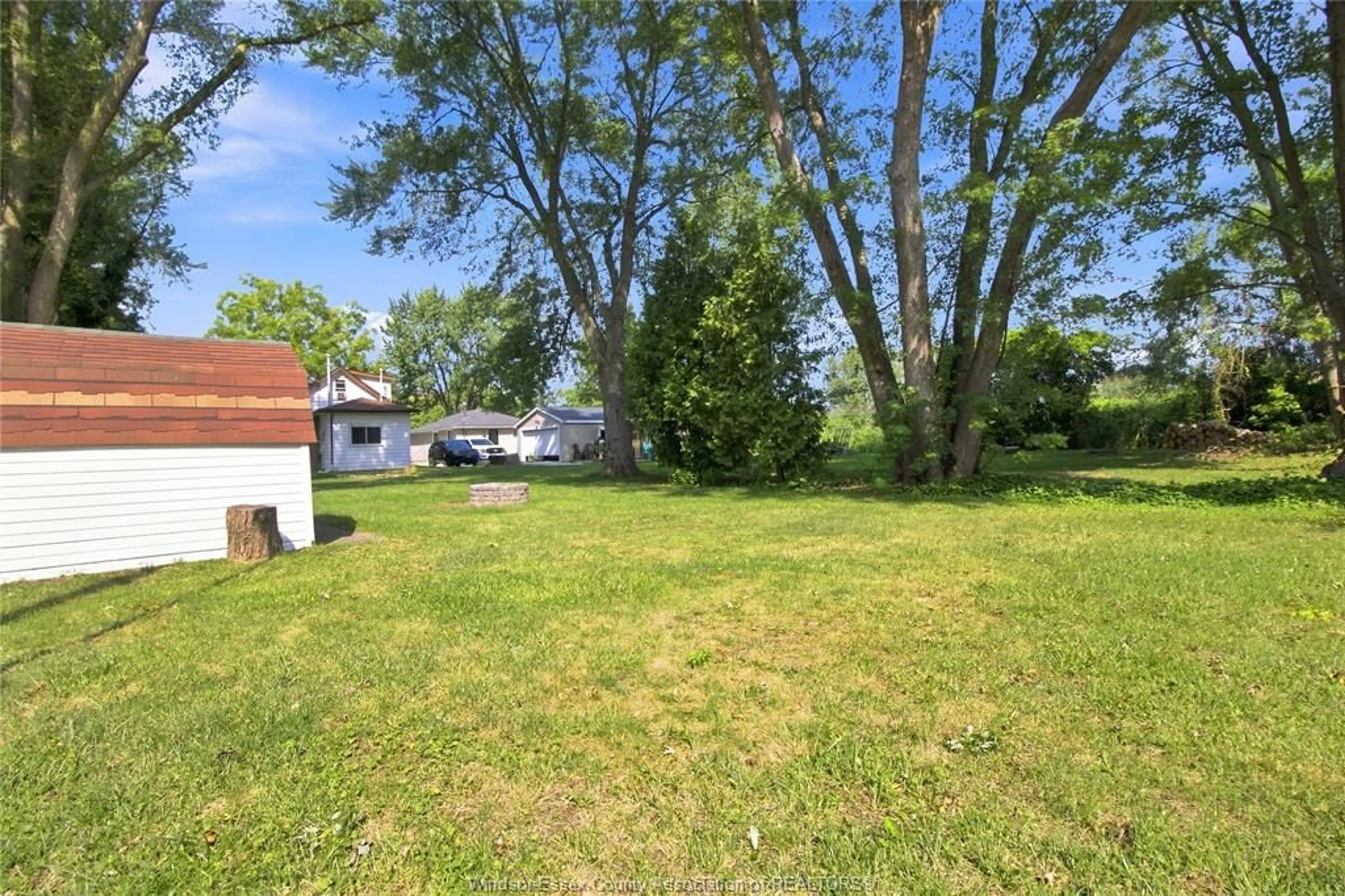 A pic from outside/outdoor area/front of a property/back of a property/a pic from drone, street for 134 ALEXANDER Ave, Lakeshore Ontario N0R 1A0
