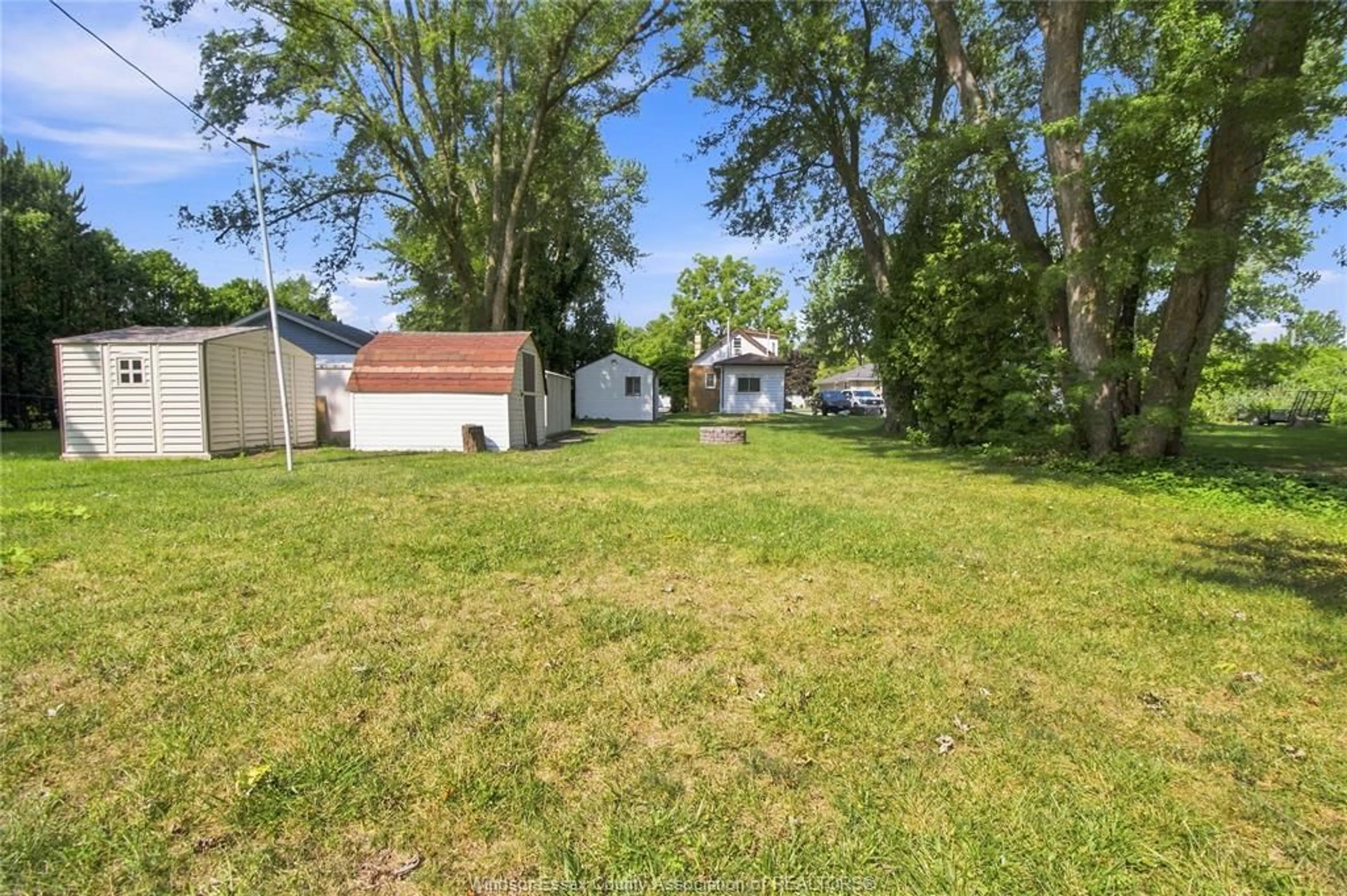 A pic from outside/outdoor area/front of a property/back of a property/a pic from drone, street for 134 ALEXANDER Ave, Lakeshore Ontario N0R 1A0
