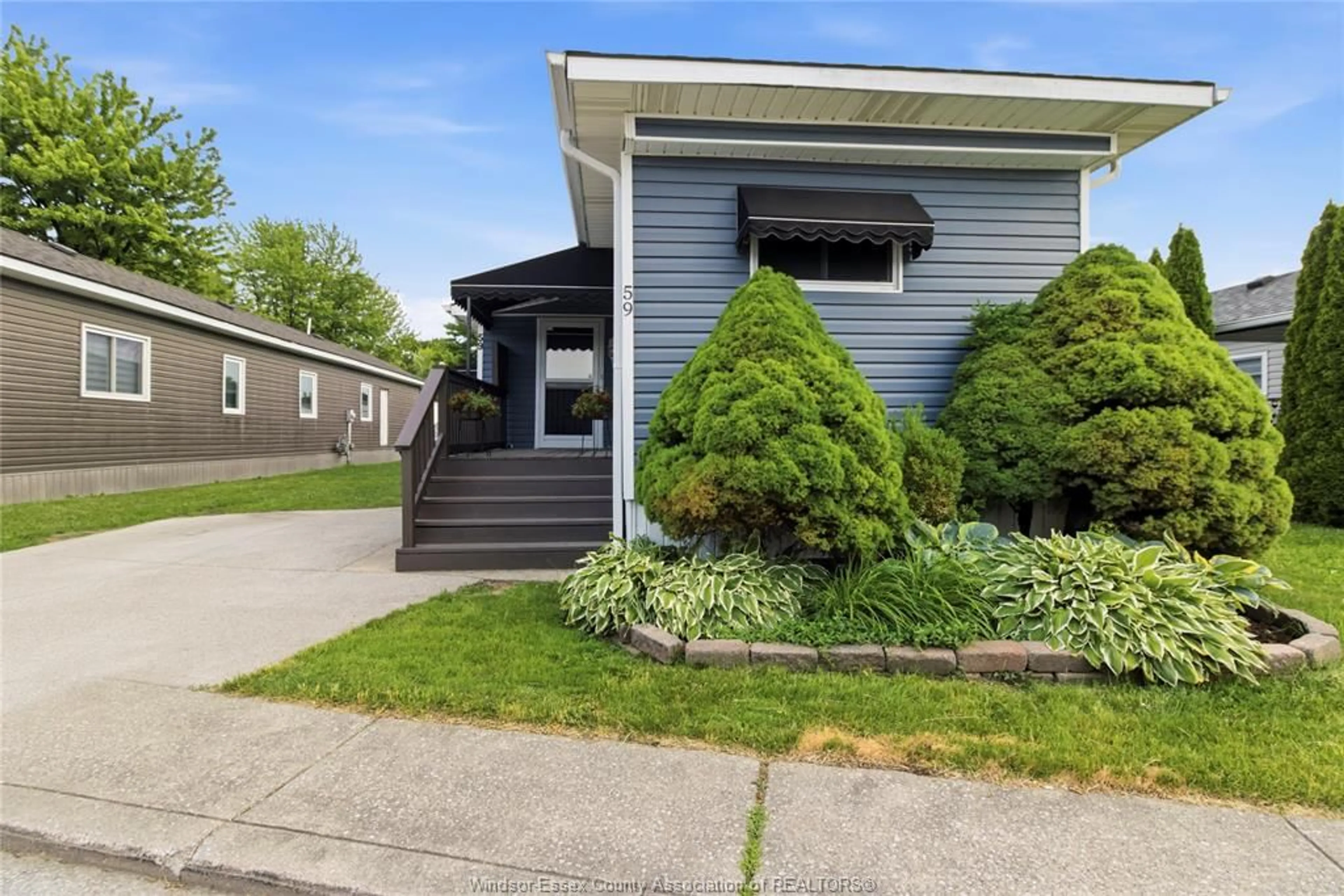 Home with vinyl exterior material, street for 59 WILDER, Lakeshore Ontario N8N 2S6