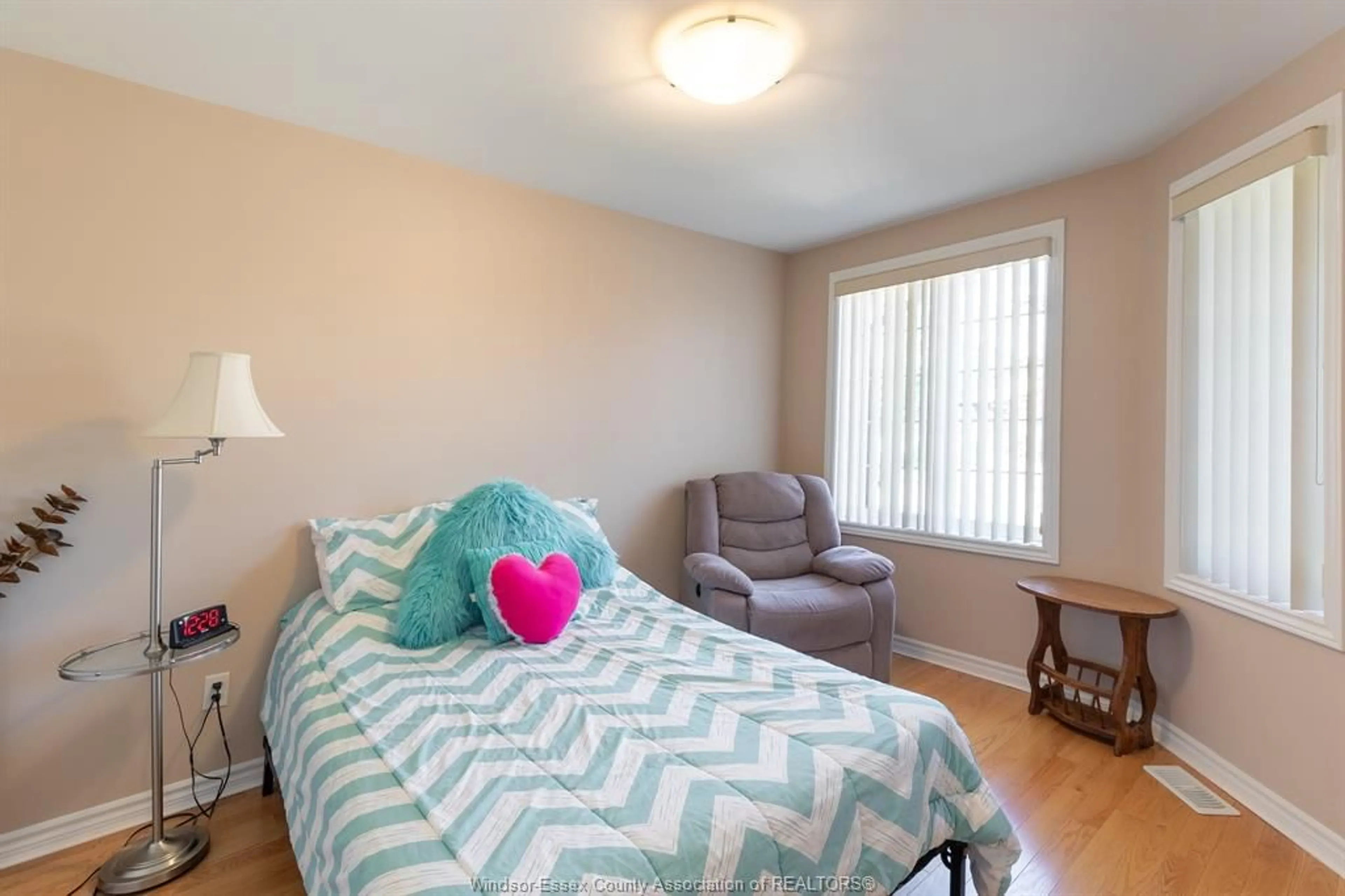 Bedroom with bed, wood/laminate floor for 11123 SNOWCREST St, Windsor Ontario N8F 1M2