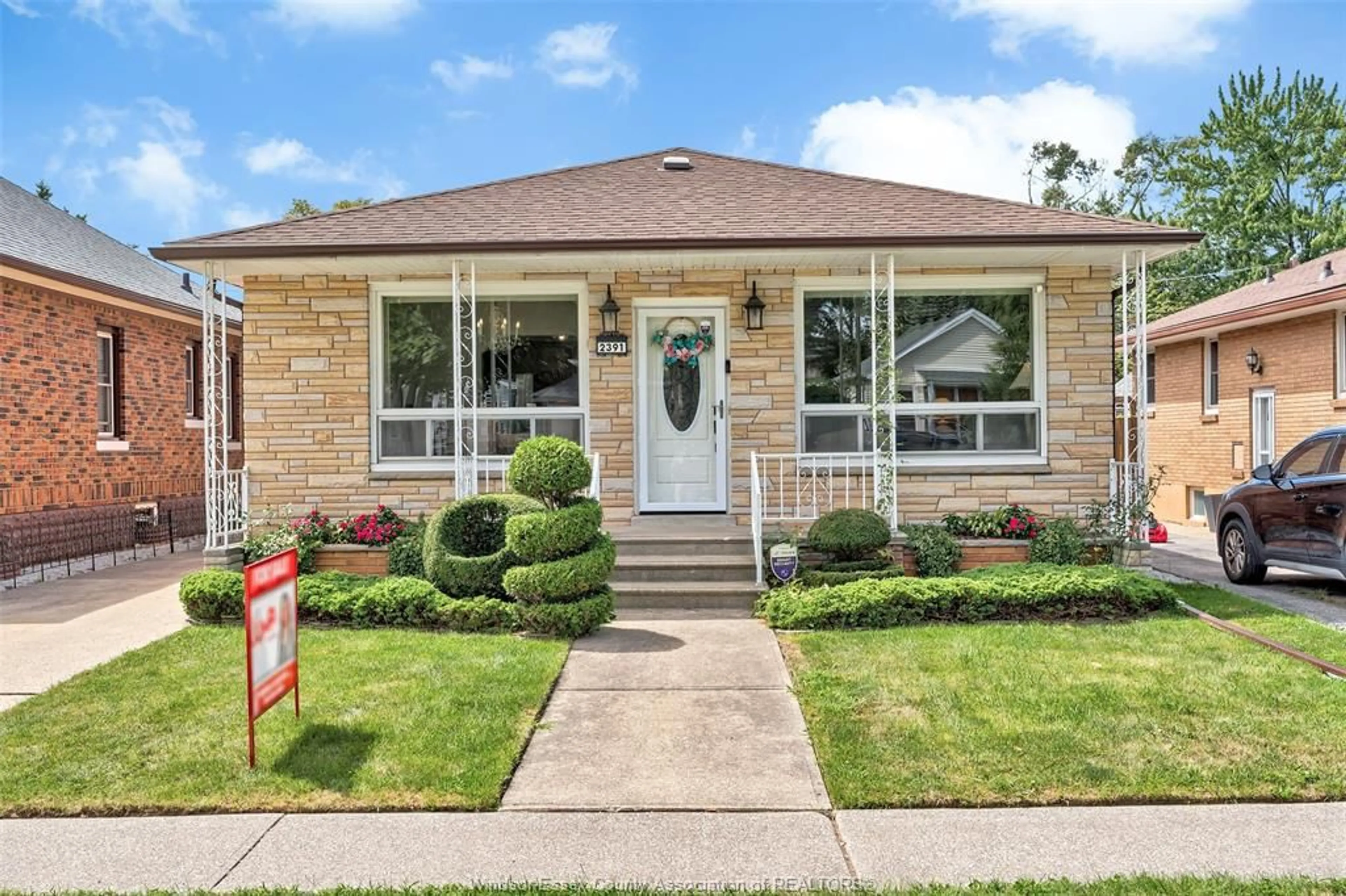 Home with brick exterior material, street for 2391 MEIGHEN Rd, Windsor Ontario N8W 4B8