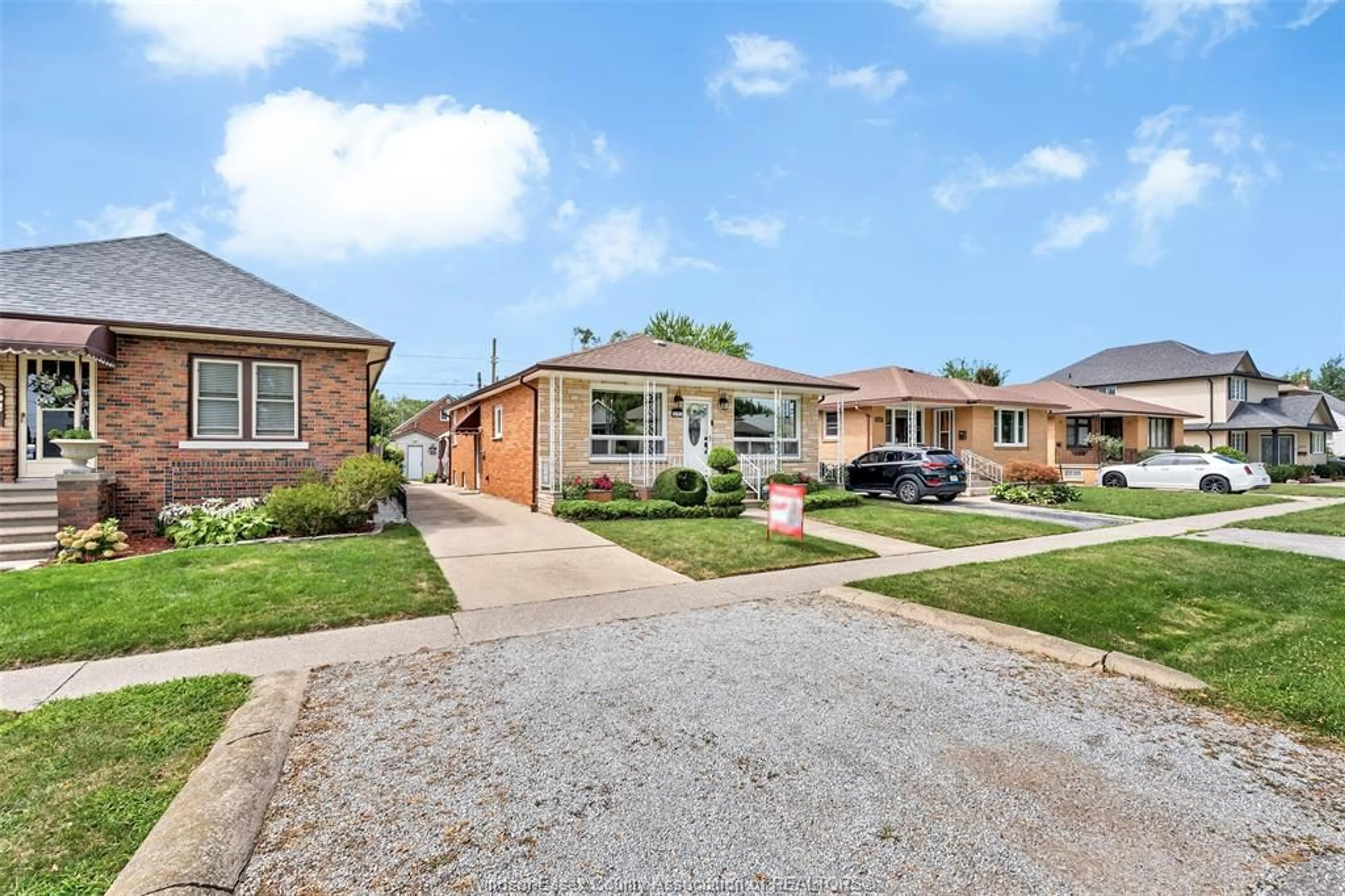 Home with brick exterior material, street for 2391 MEIGHEN Rd, Windsor Ontario N8W 4B8