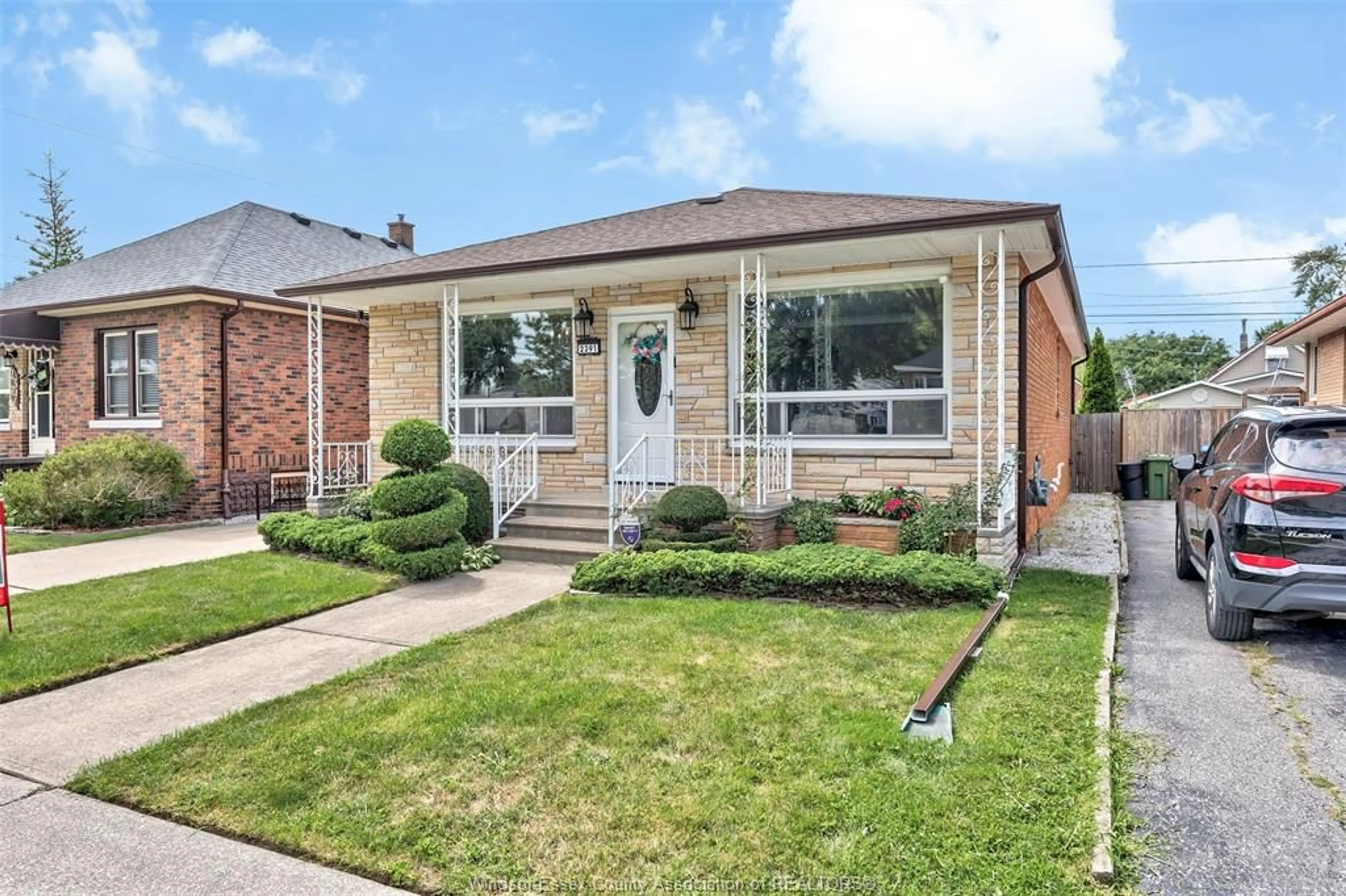 Home with brick exterior material, street for 2391 MEIGHEN Rd, Windsor Ontario N8W 4B8