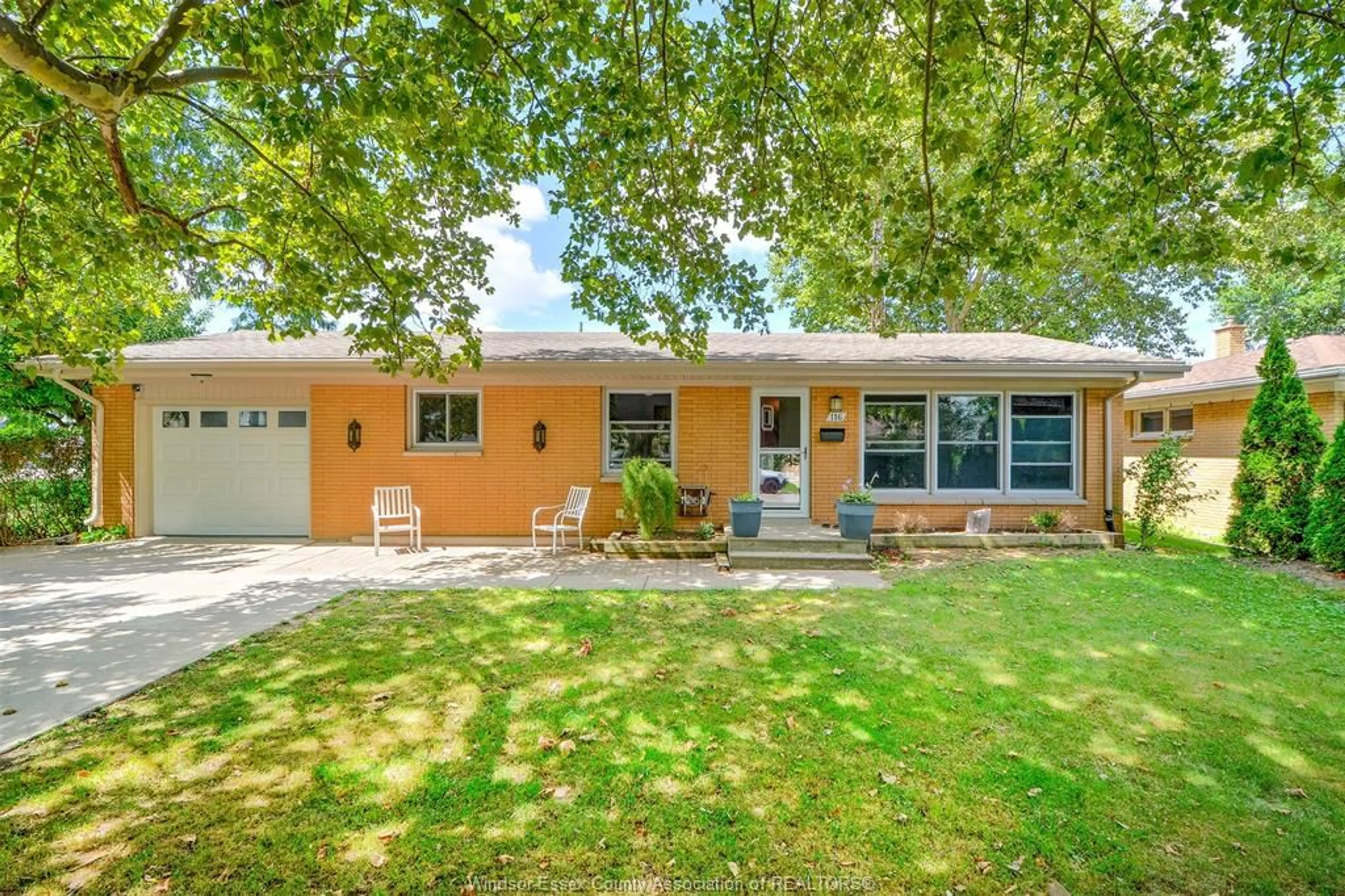 Home with brick exterior material, street for 116 QUEENS Ave, Leamington Ontario N8H 3H4