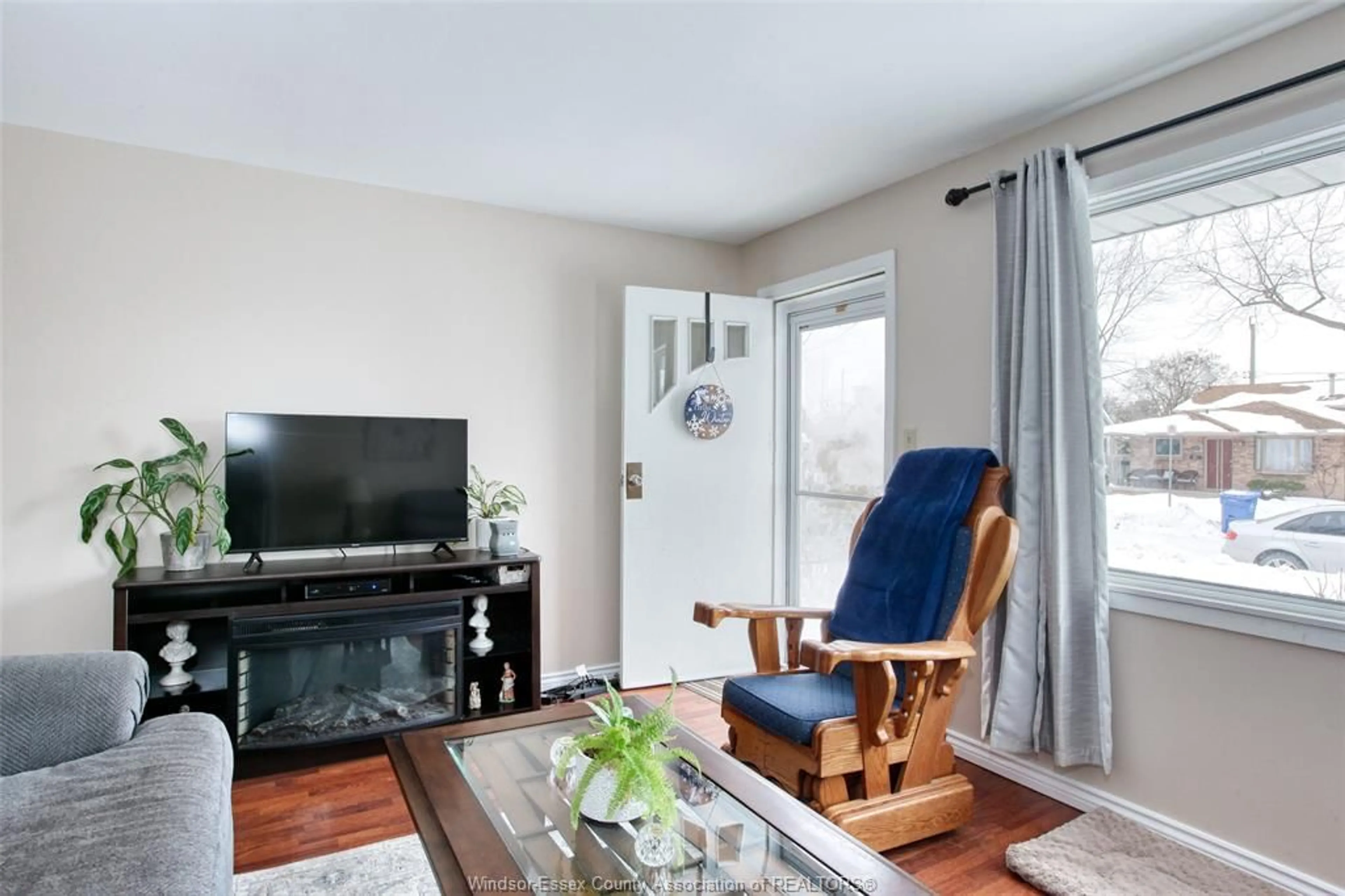 Living room with furniture, wood/laminate floor for 1067 ST. LOUIS, Windsor Ontario N8S 2K9
