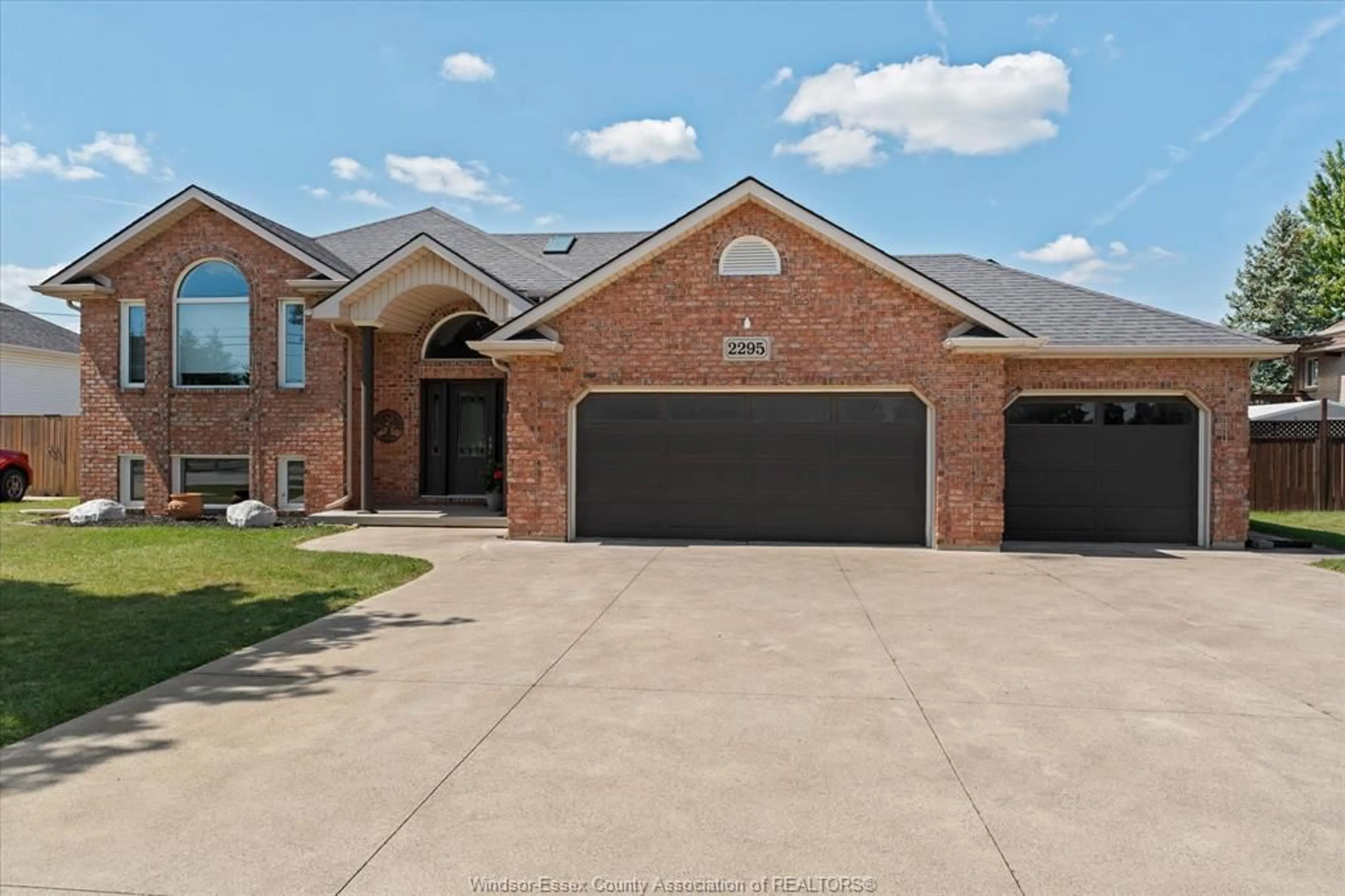 Home with brick exterior material, street for 2295 LESPERANCE Rd, Tecumseh Ontario N8N 4R9