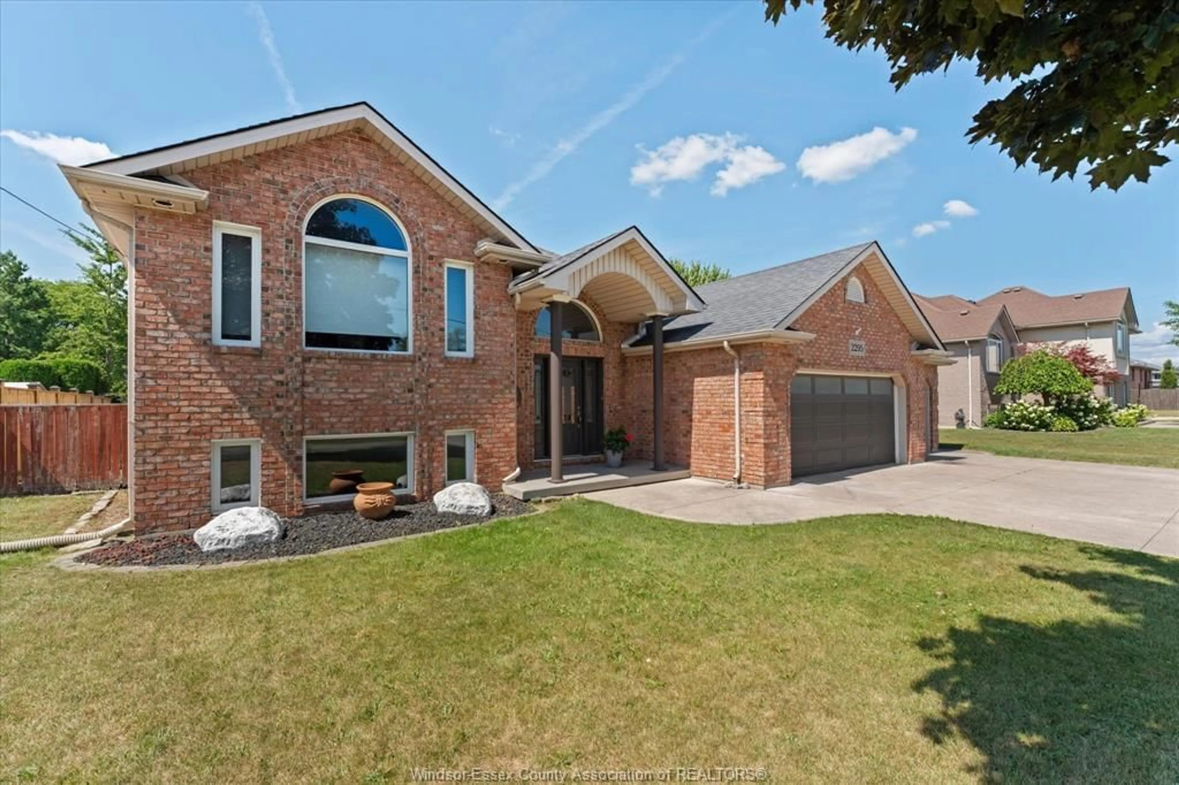 Home with brick exterior material, street for 2295 LESPERANCE Rd, Tecumseh Ontario N8N 4R9