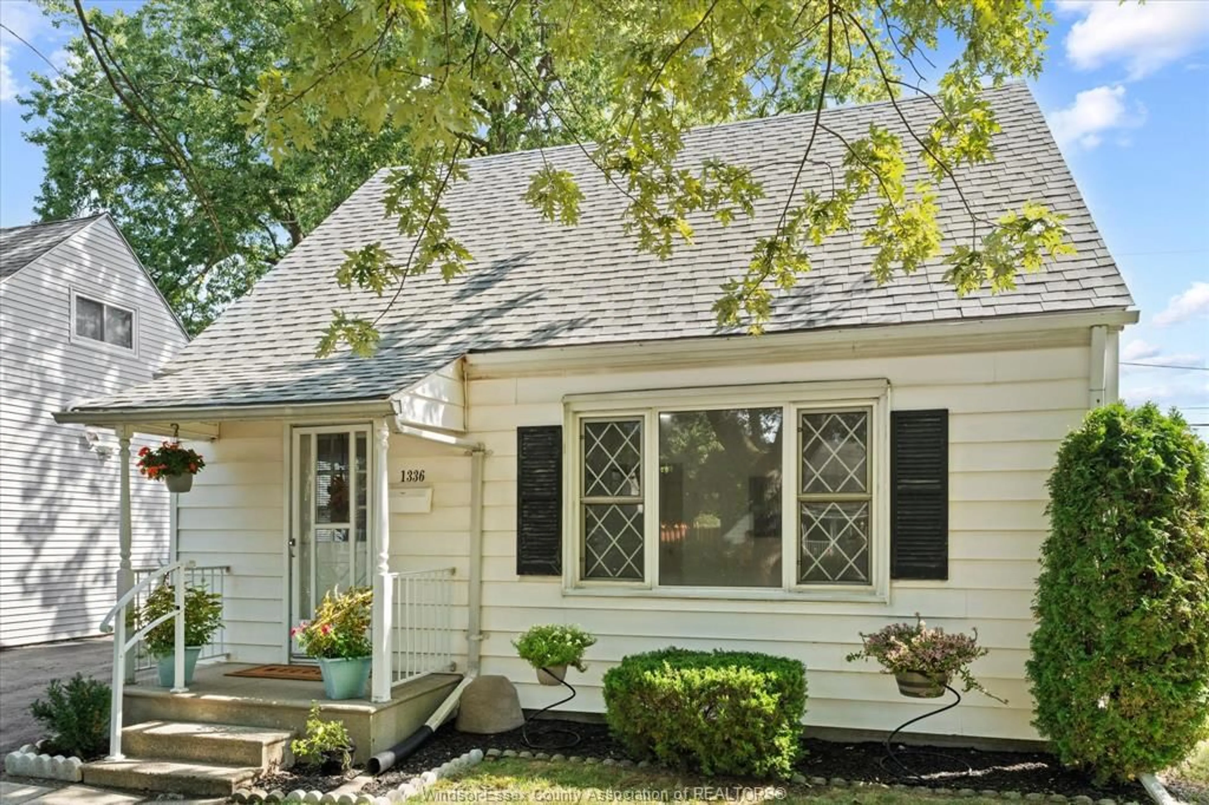 Home with vinyl exterior material, street for 1336 PARTINGTON, Windsor Ontario N9B 2P6