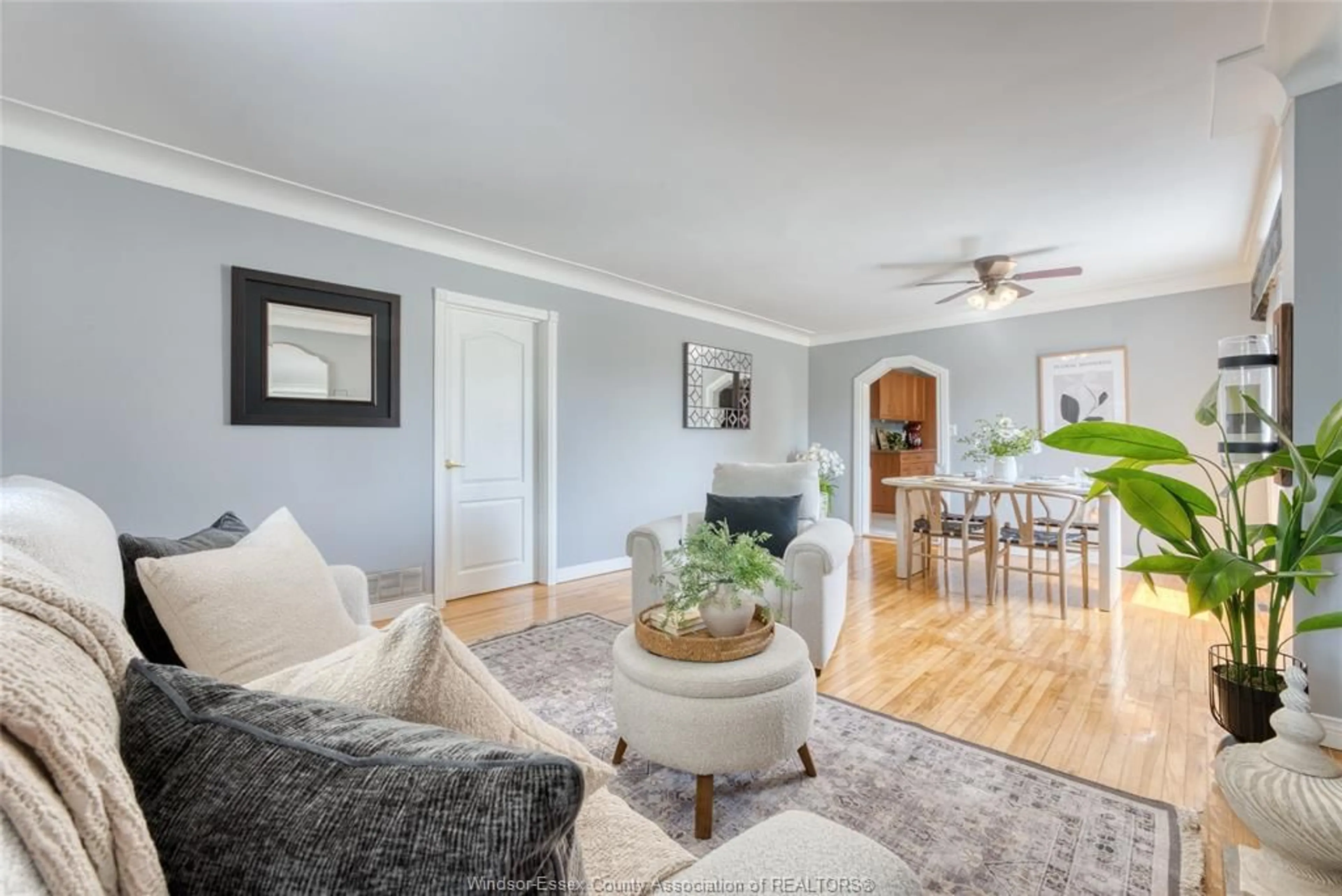 Living room with furniture, wood/laminate floor for 3690 TURNER Rd, Windsor Ontario N8W 3N1