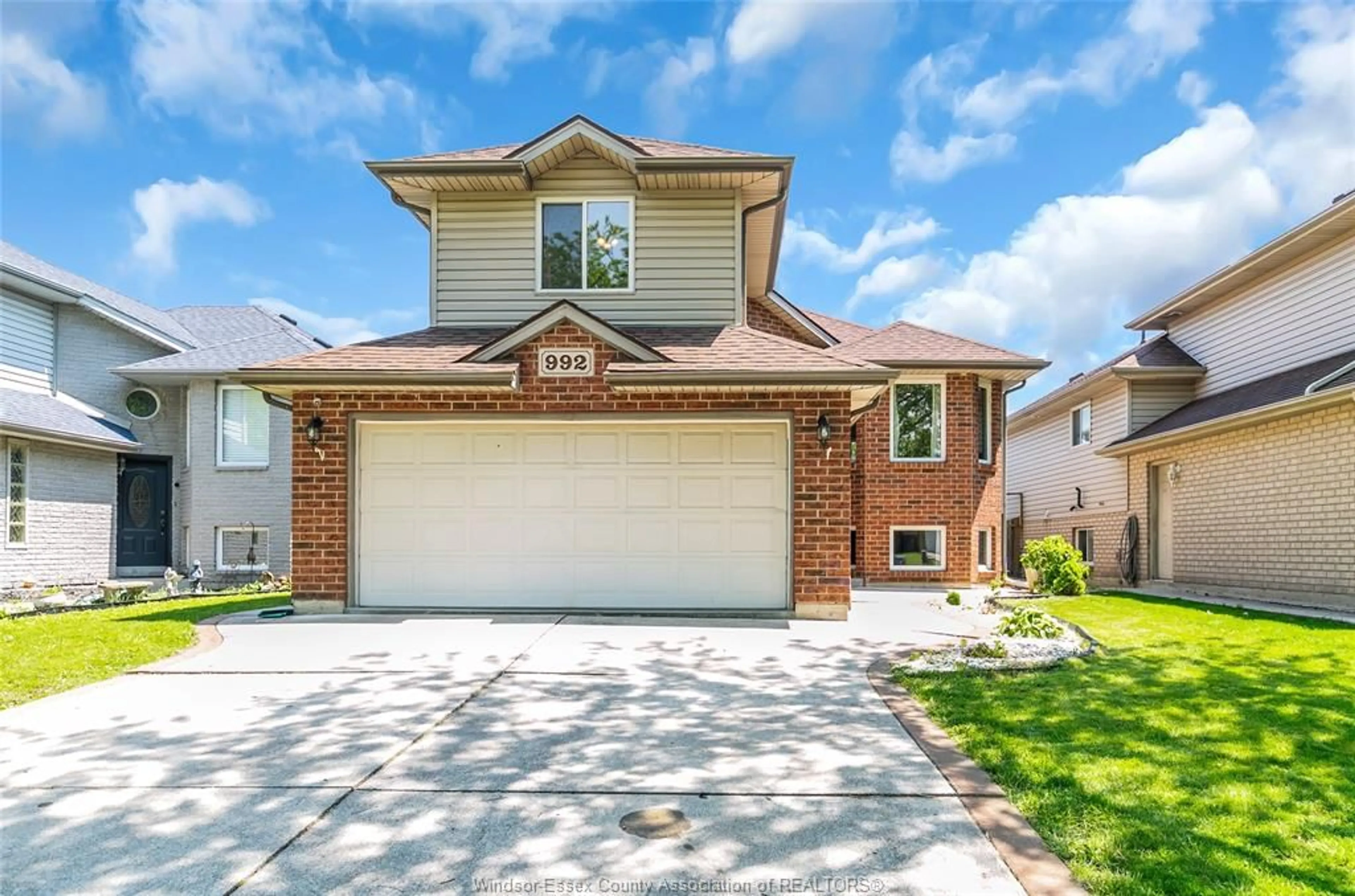 Home with brick exterior material, street for 992 WHISTLER, Windsor Ontario N8P 1L2