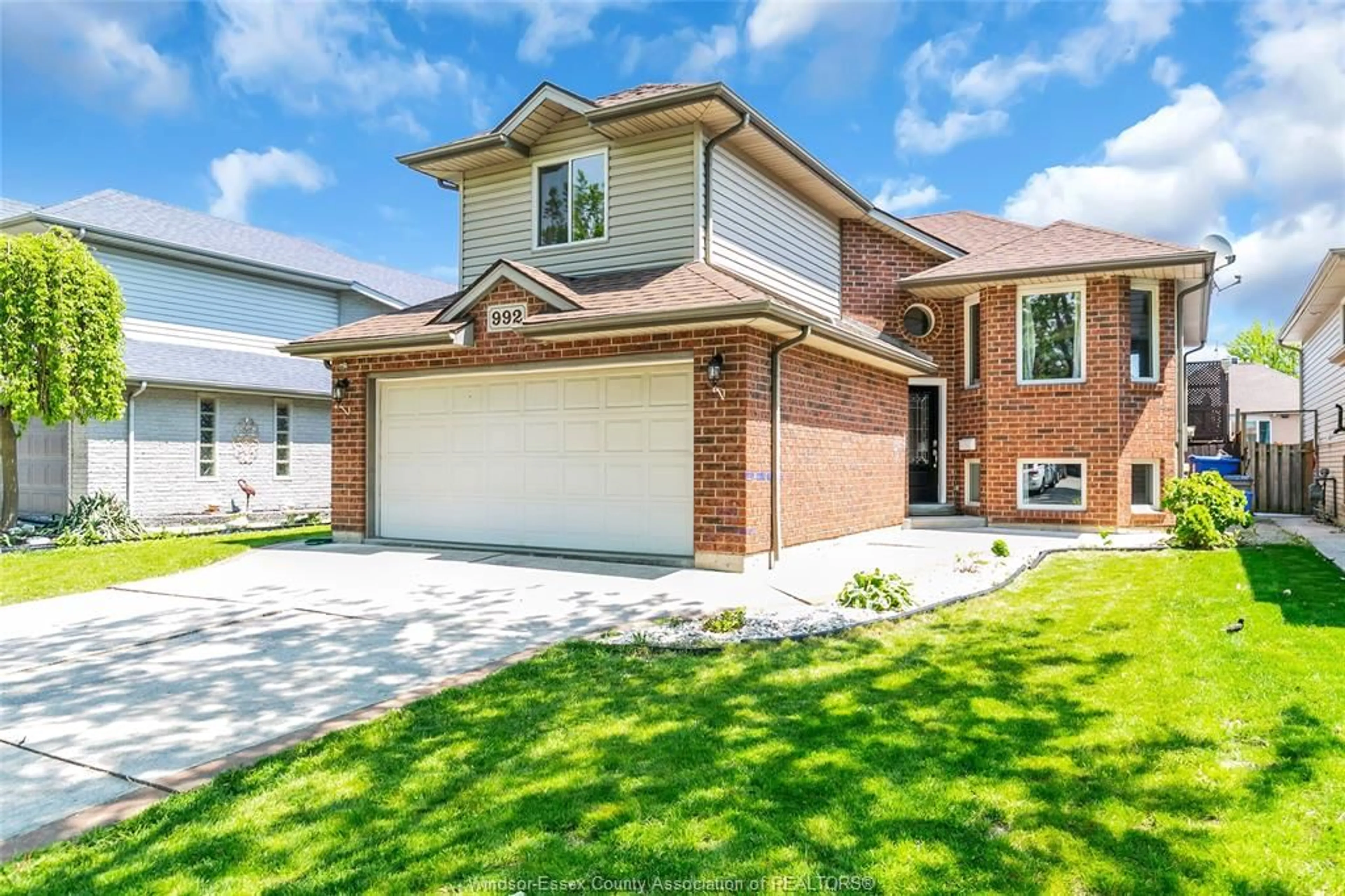 Home with brick exterior material, street for 992 WHISTLER, Windsor Ontario N8P 1L2