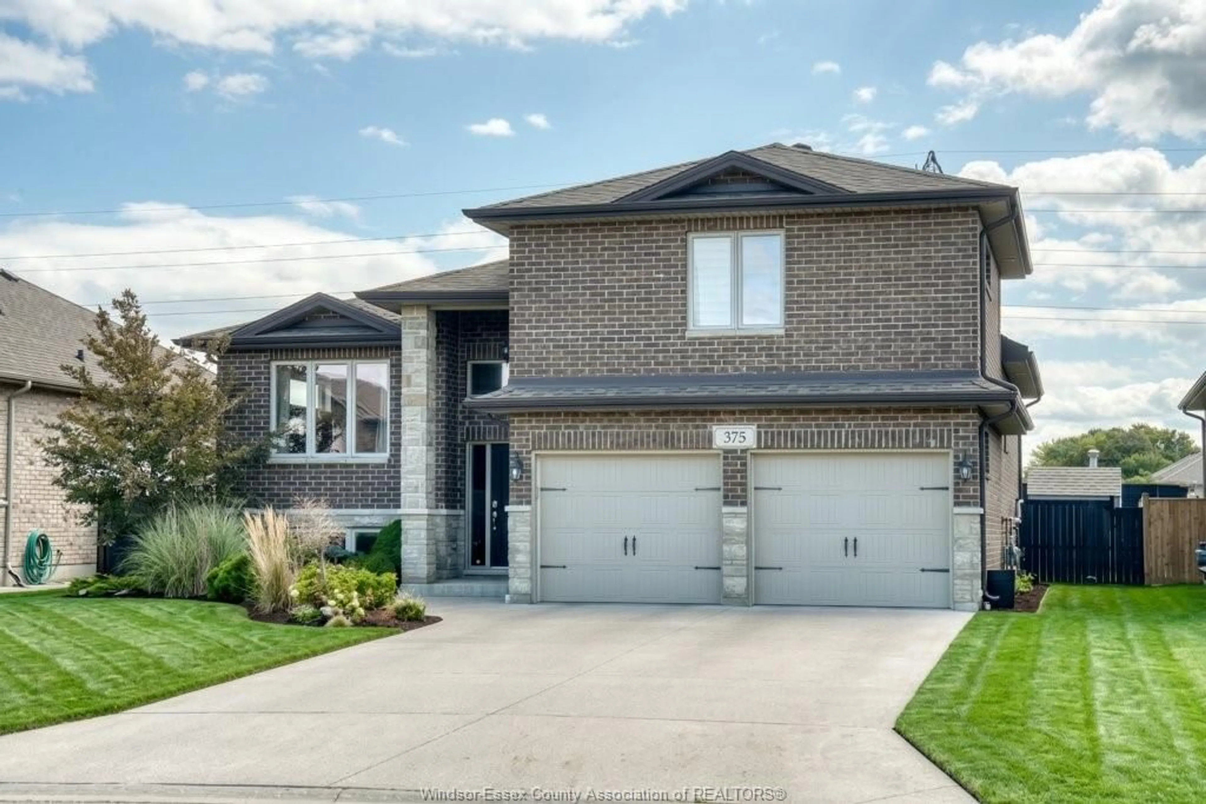 Home with brick exterior material, street for 375 PIROLI Cres, Lakeshore Ontario N8L 0R8