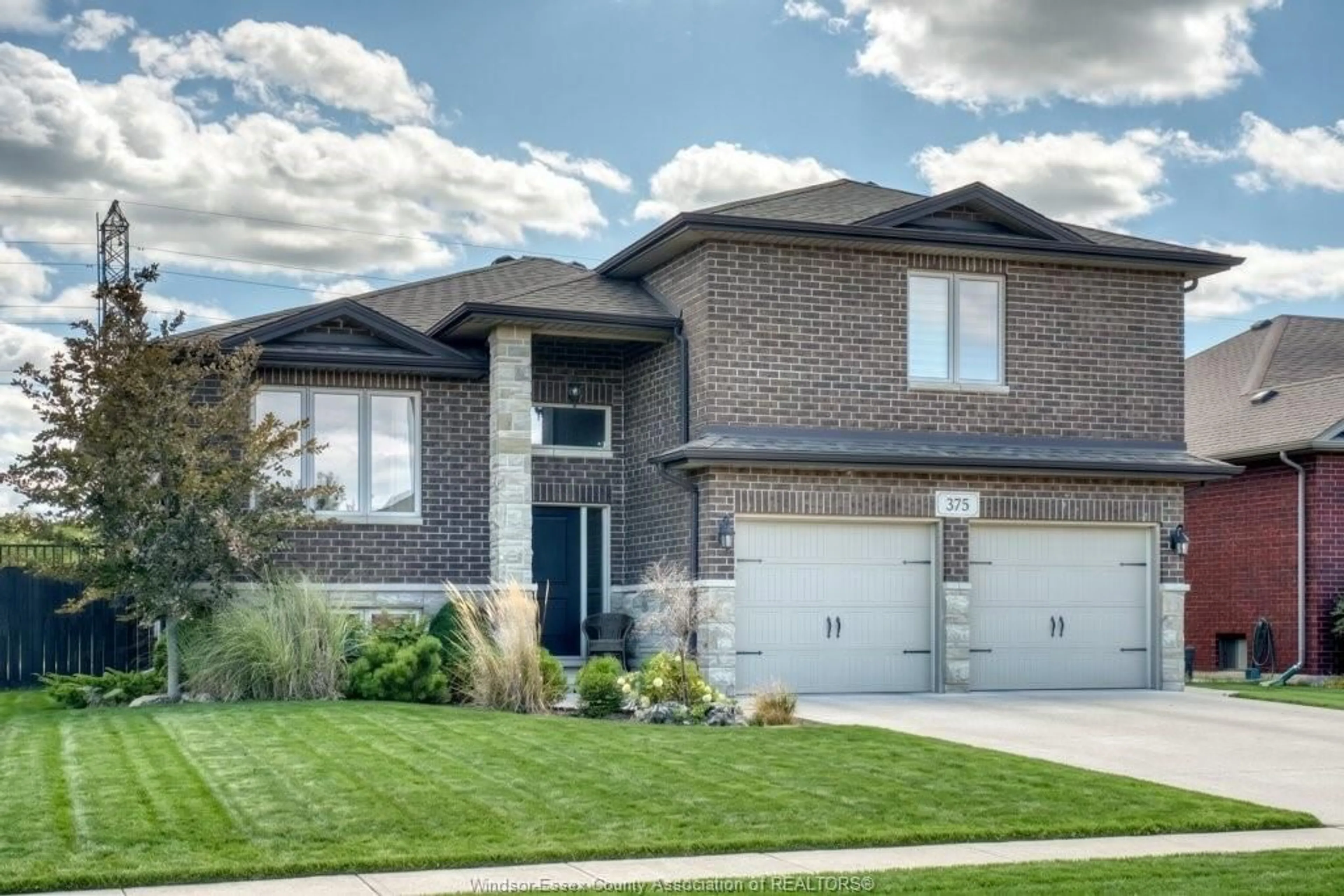 Home with brick exterior material, street for 375 PIROLI Cres, Lakeshore Ontario N8L 0R8