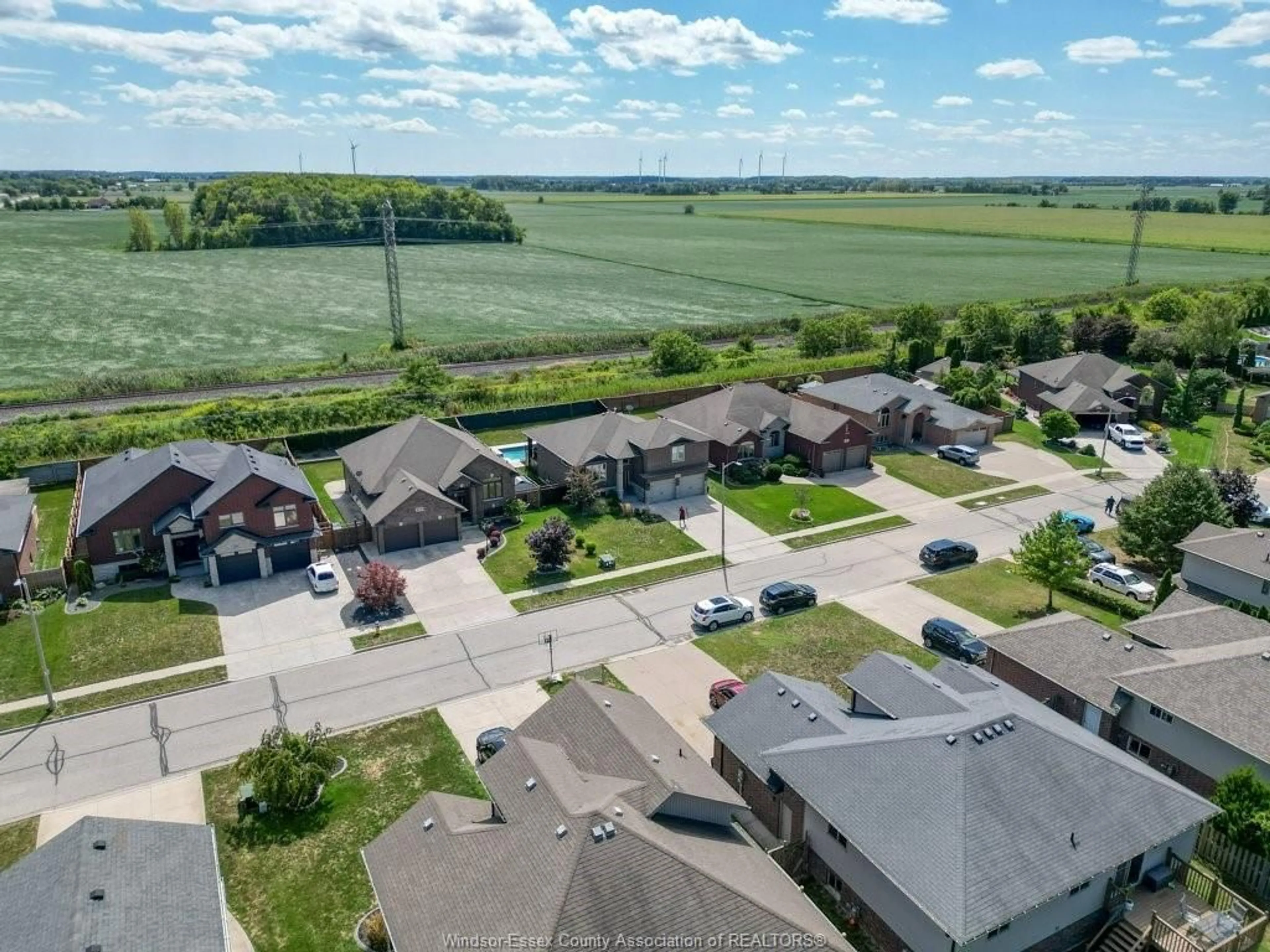 A pic from outside/outdoor area/front of a property/back of a property/a pic from drone, street for 375 PIROLI Cres, Lakeshore Ontario N8L 0R8