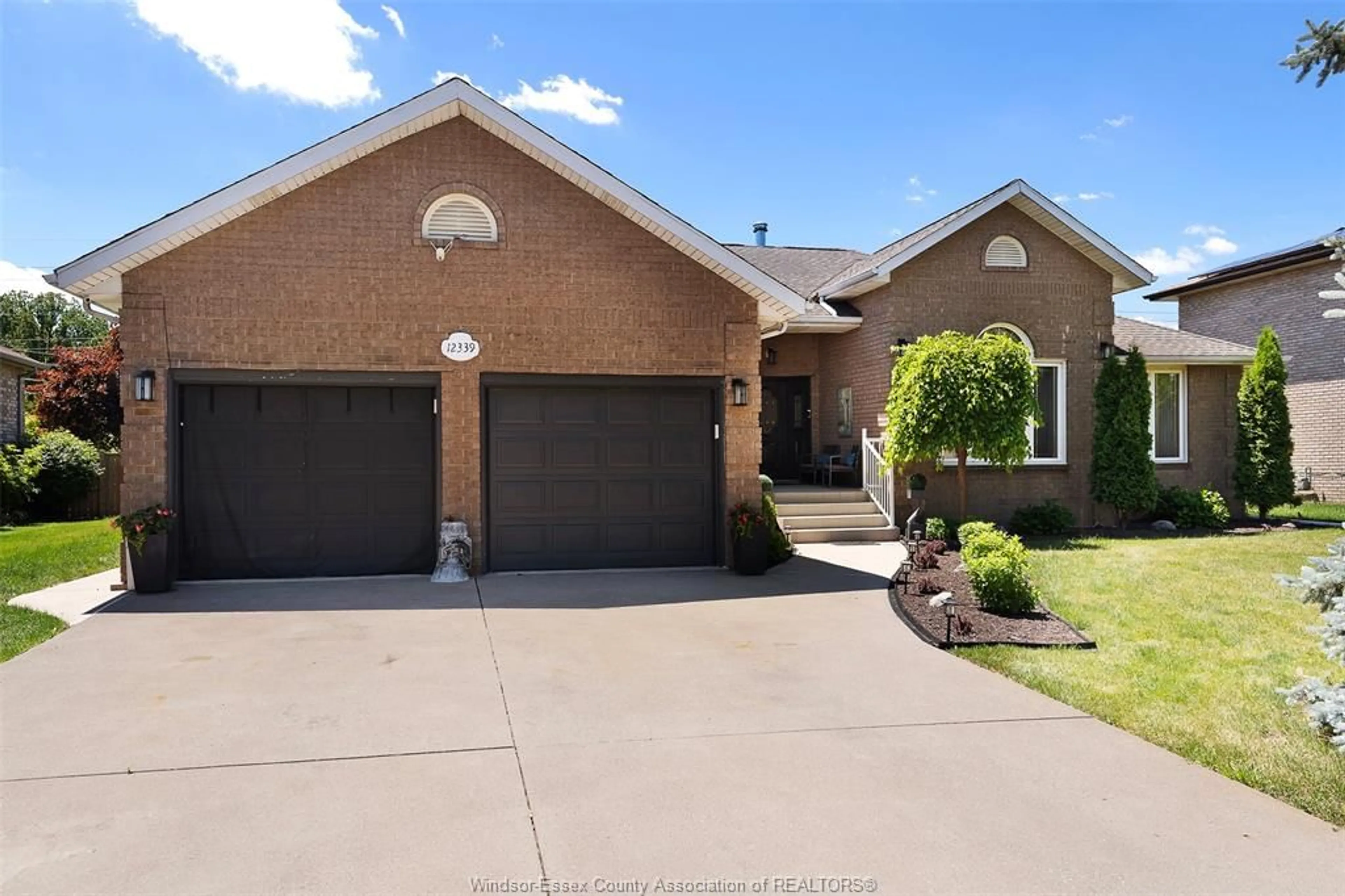 Home with brick exterior material, street for 12339 FUNARO Cres, Tecumseh Ontario N9K 1B2