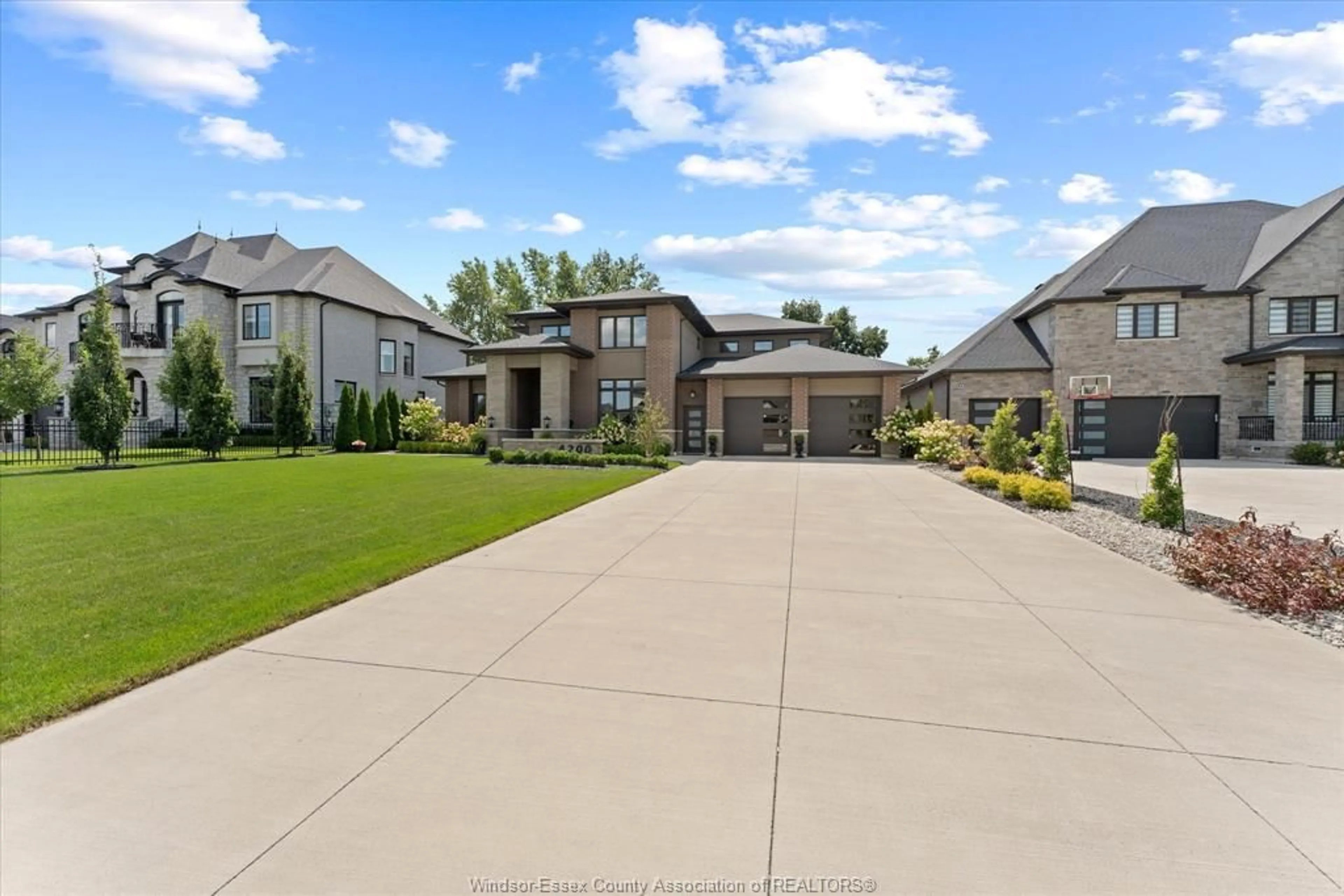 A pic from outside/outdoor area/front of a property/back of a property/a pic from drone, street for 4200 DONATO Dr, LaSalle Ontario N9H 0L5