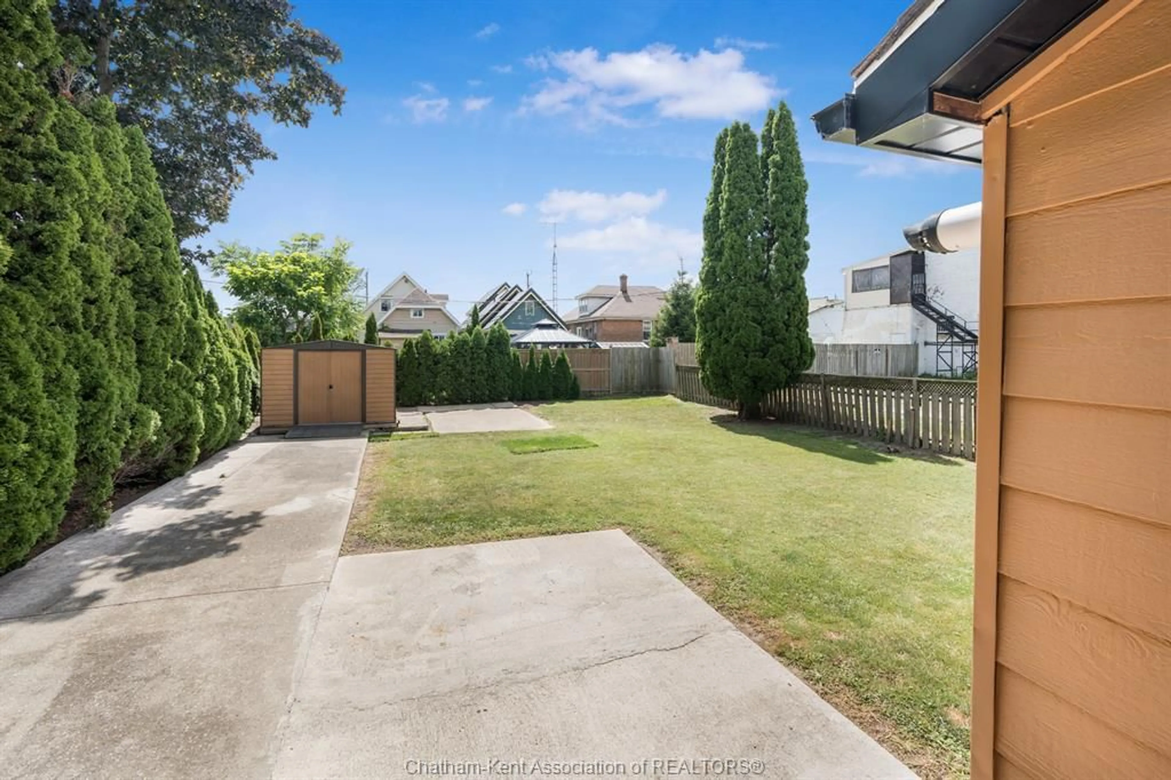 A pic from outside/outdoor area/front of a property/back of a property/a pic from drone, street for 74 Barthe St, Chatham Ontario N7L 1T6