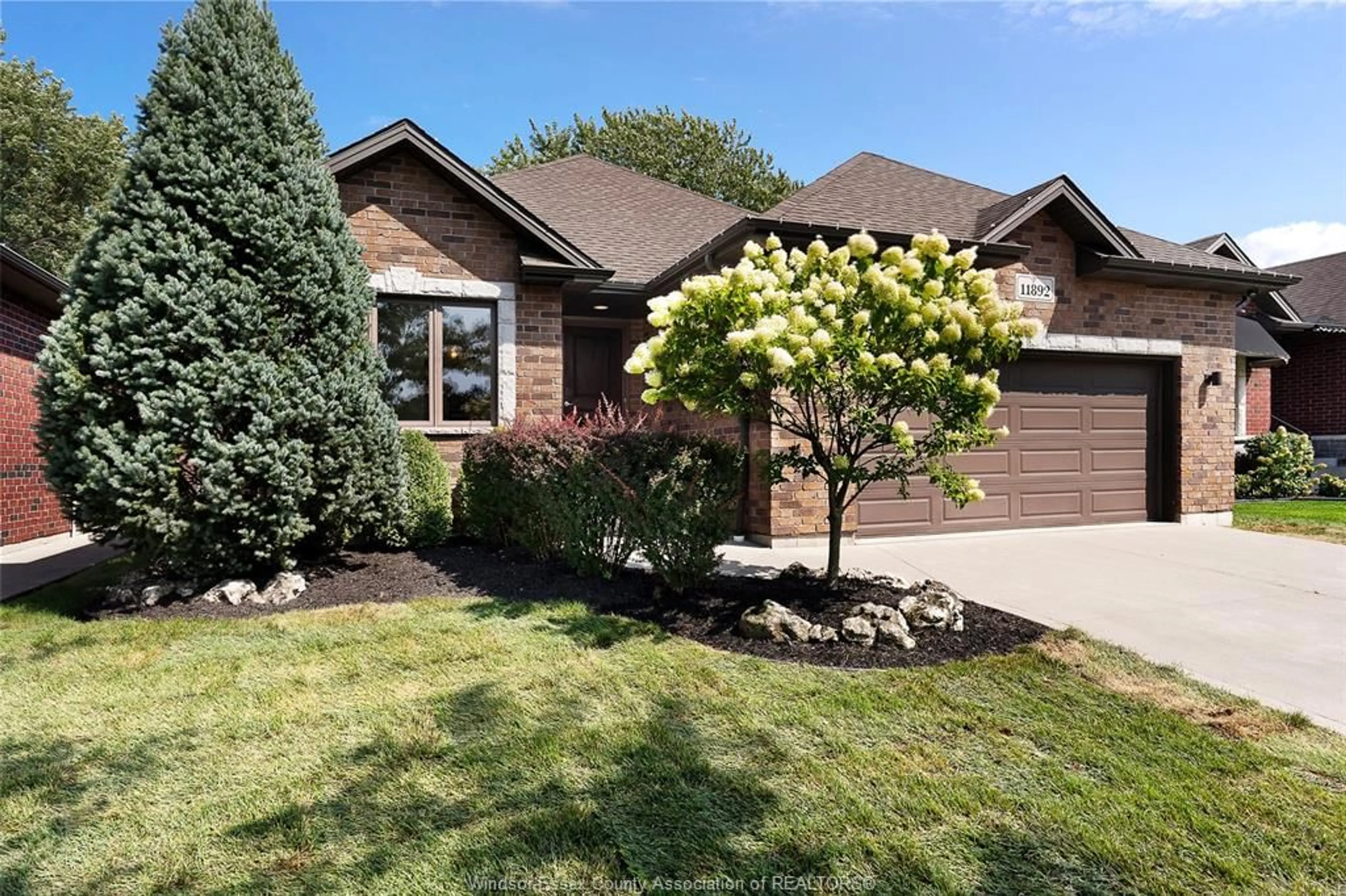 Home with brick exterior material, street for 11892 Boulder Cres, Windsor Ontario N8P 1Z4