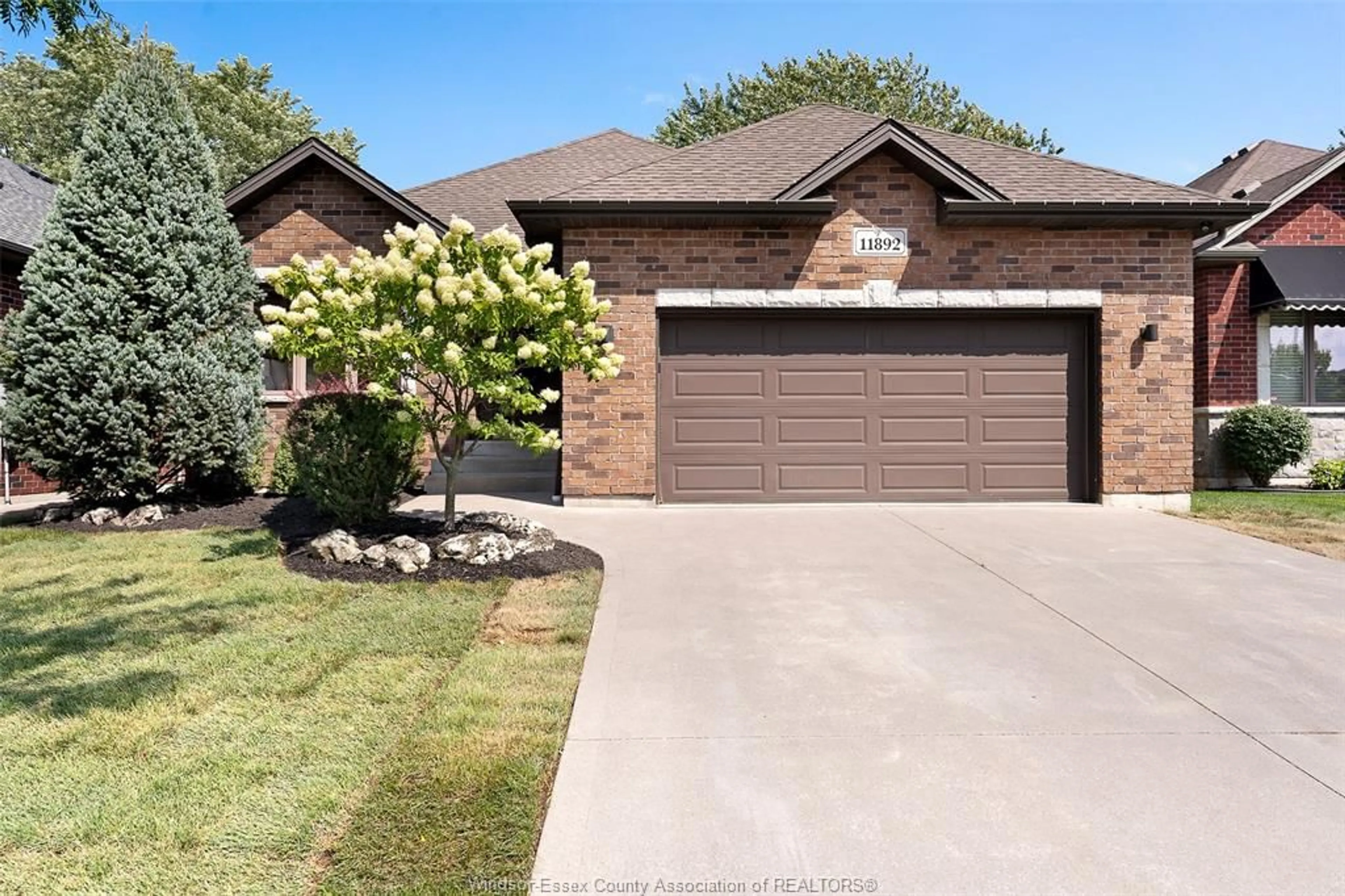 Home with brick exterior material, street for 11892 Boulder Cres, Windsor Ontario N8P 1Z4