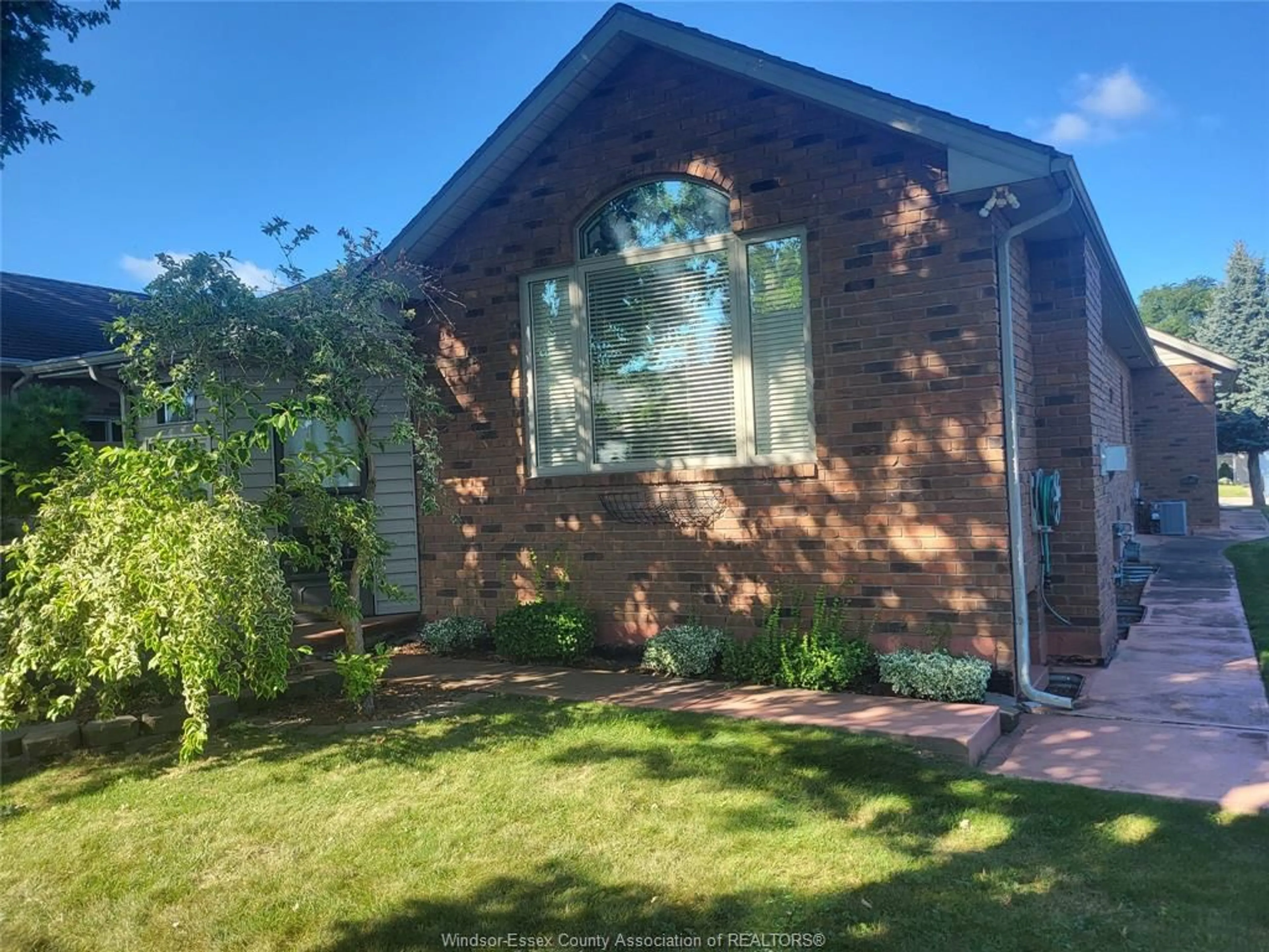 Home with brick exterior material, unknown for 1410 POISSON St, Tecumseh Ontario N8N 1T6