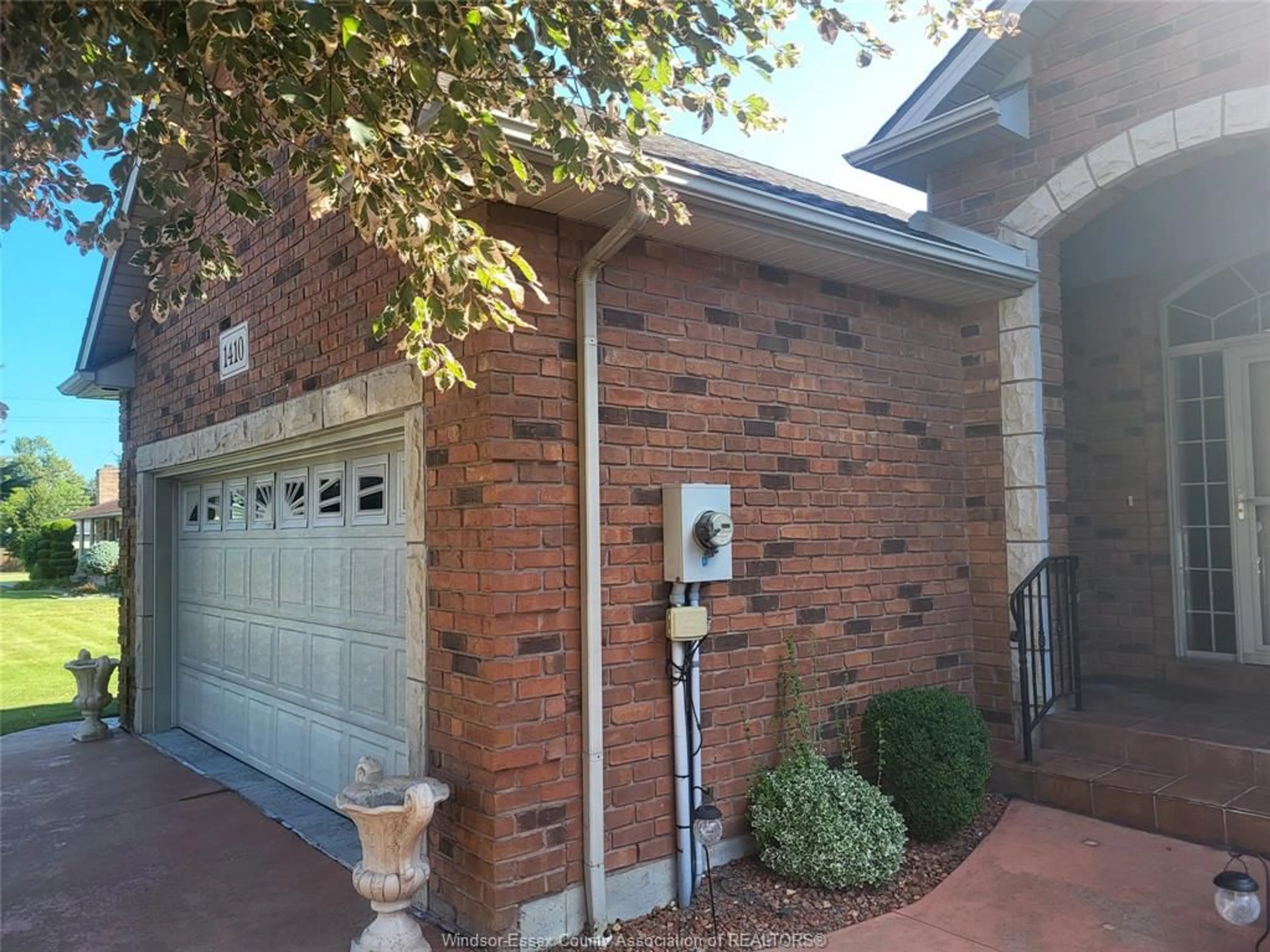 Home with brick exterior material, street for 1410 POISSON St, Tecumseh Ontario N8N 1T6