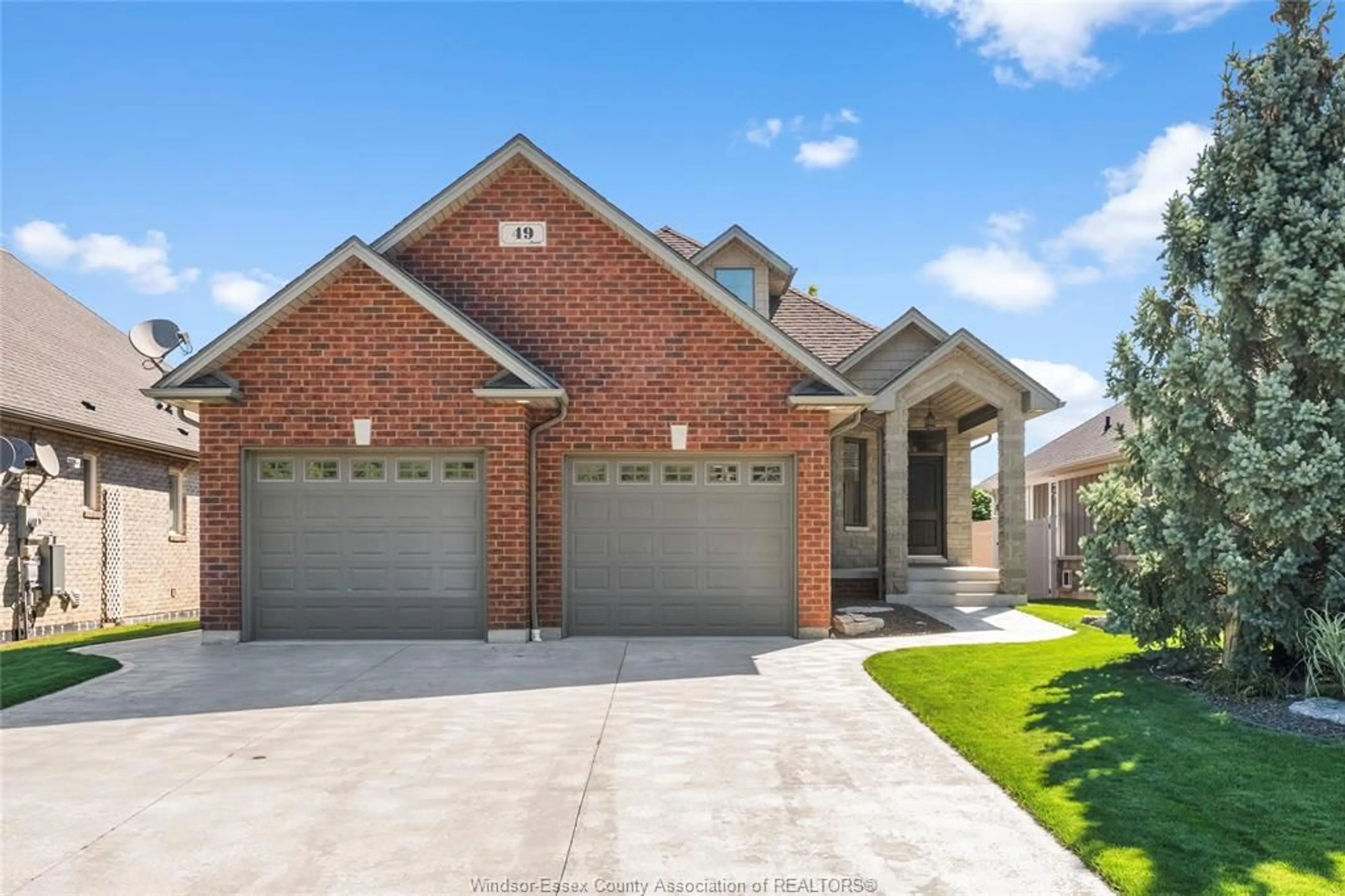 Home with brick exterior material, street for 49 Montego Bay Cres, Kingsville Ontario N9Y 4E7