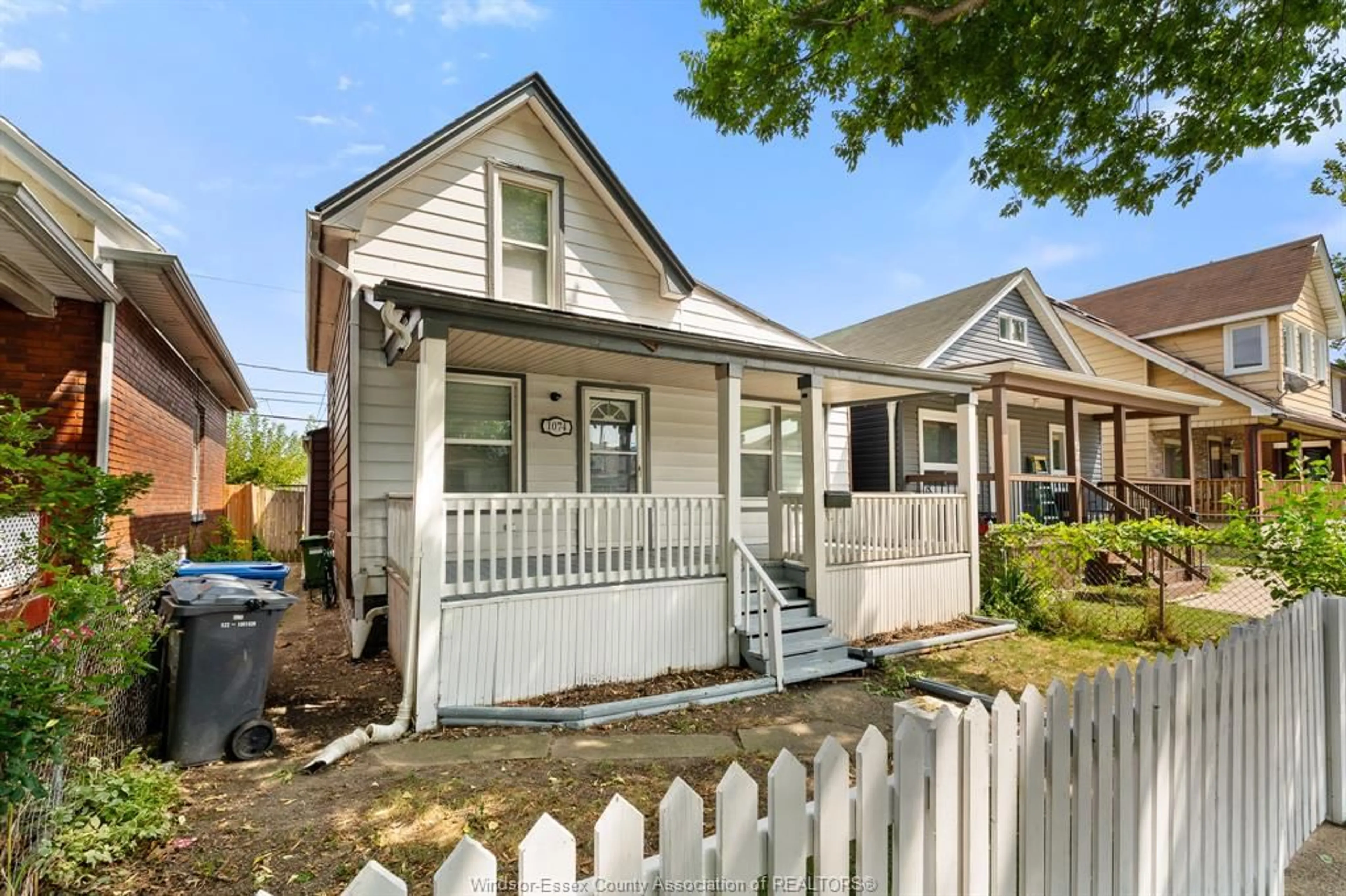 Home with vinyl exterior material, street for 1074 HICKORY Rd, Windsor Ontario N8Y 3S1