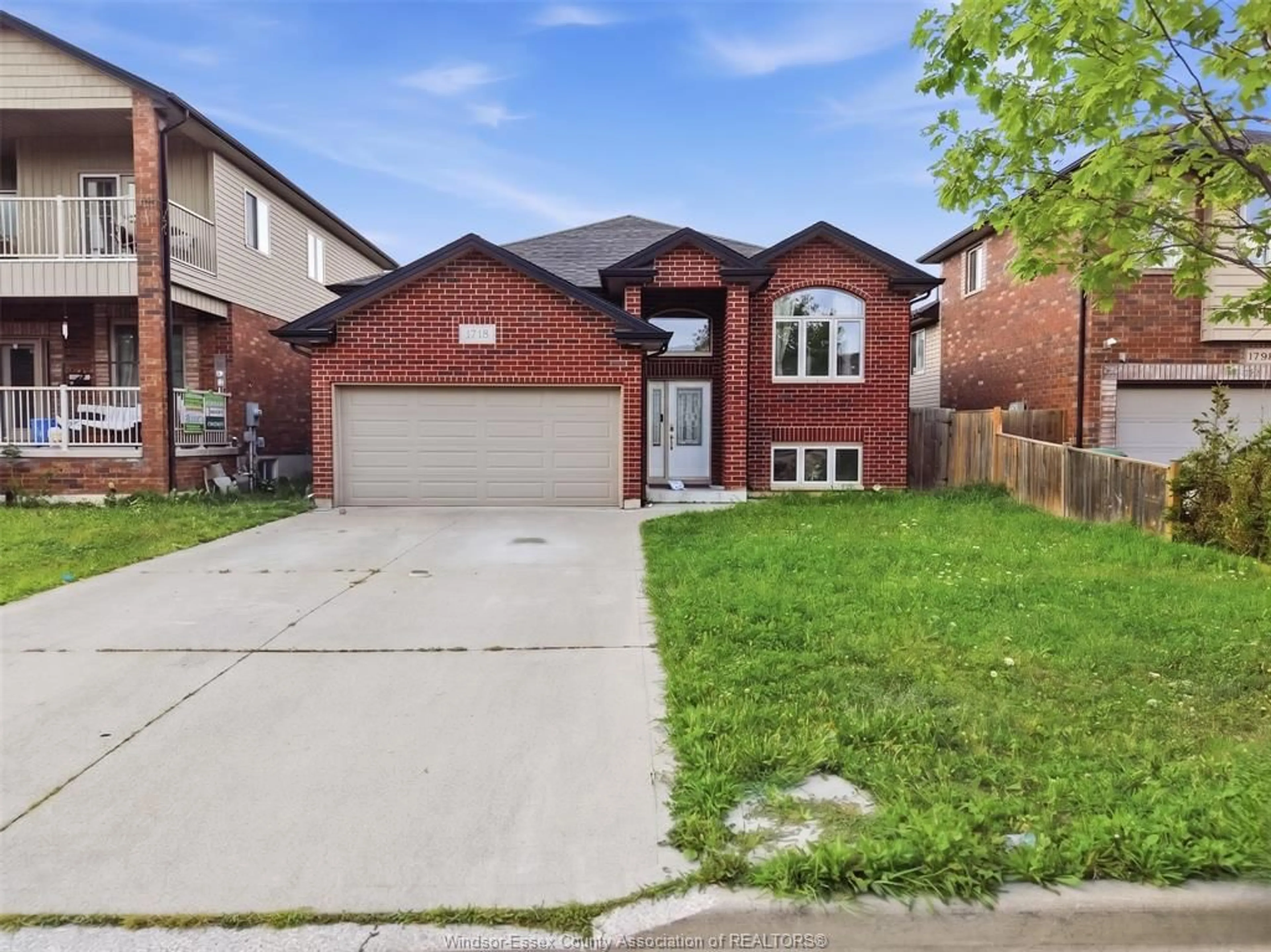 Home with brick exterior material, street for 1718 KENORA St, Windsor Ontario N9B 3X7