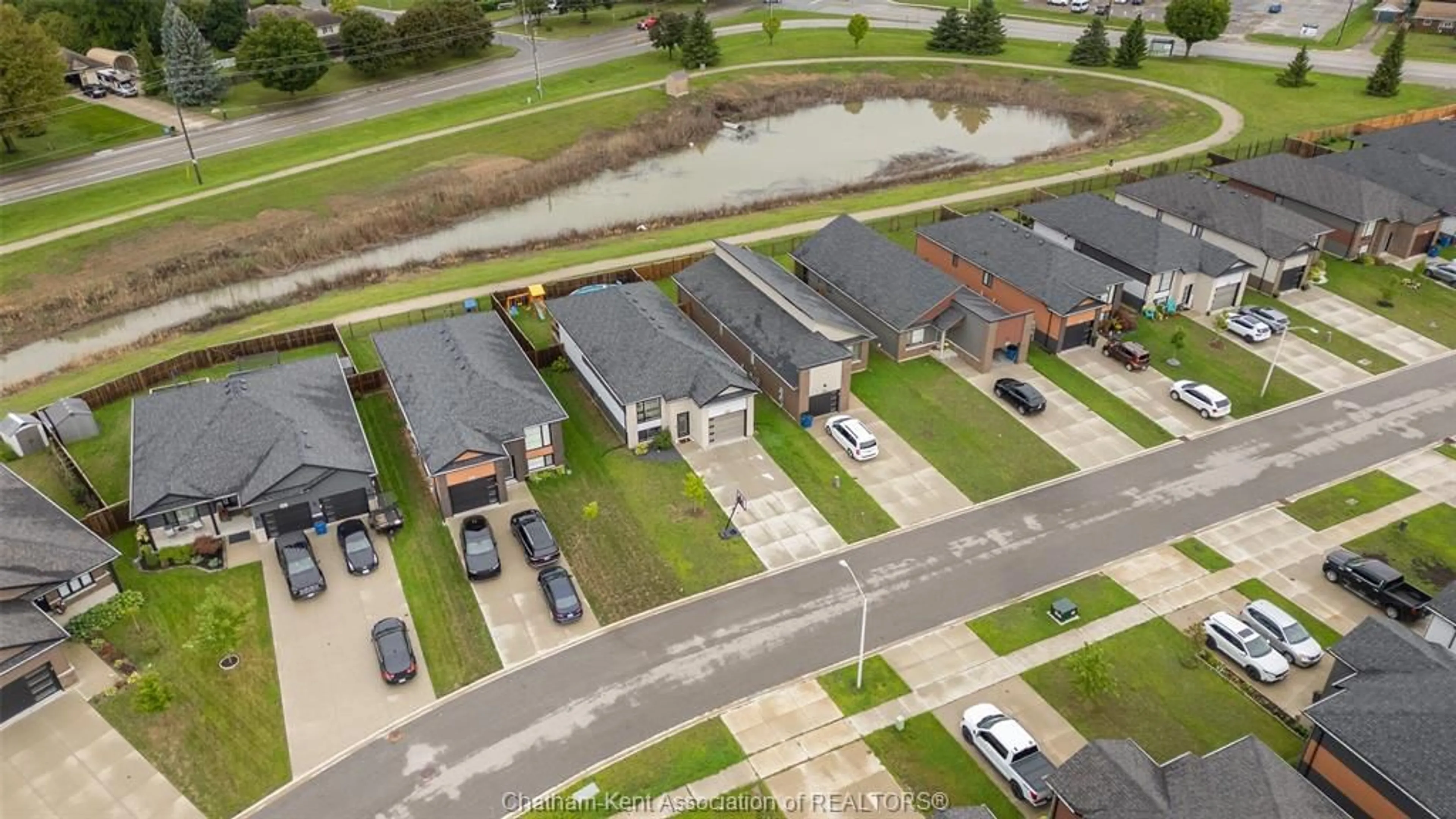A pic from outside/outdoor area/front of a property/back of a property/a pic from drone, water/lake/river/ocean view for 198 Moonstone Cres, Chatham Ontario N7M 0S1