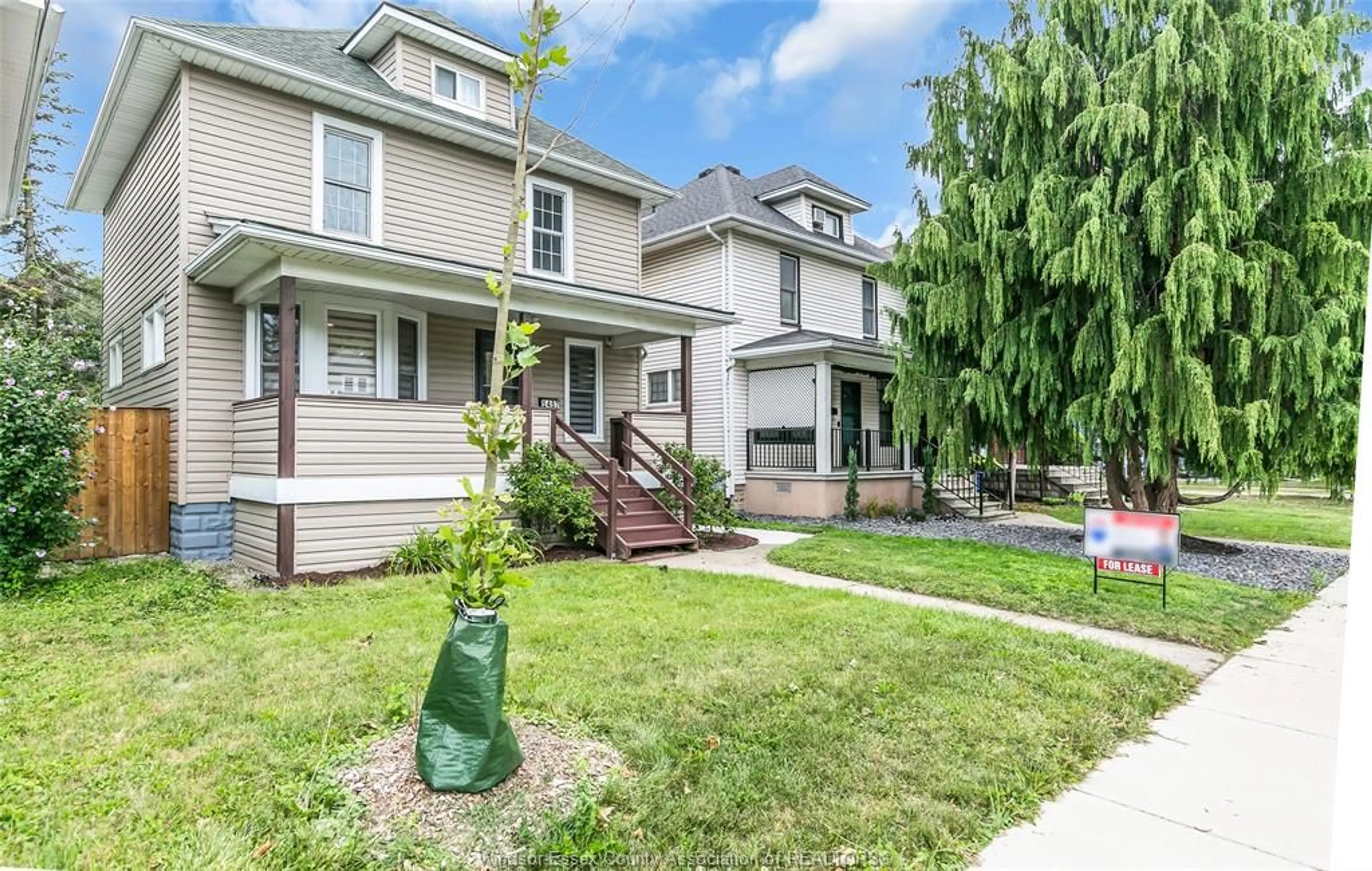 Home with vinyl exterior material, street for 1457 DOUGALL, Windsor Ontario N8X 1R9