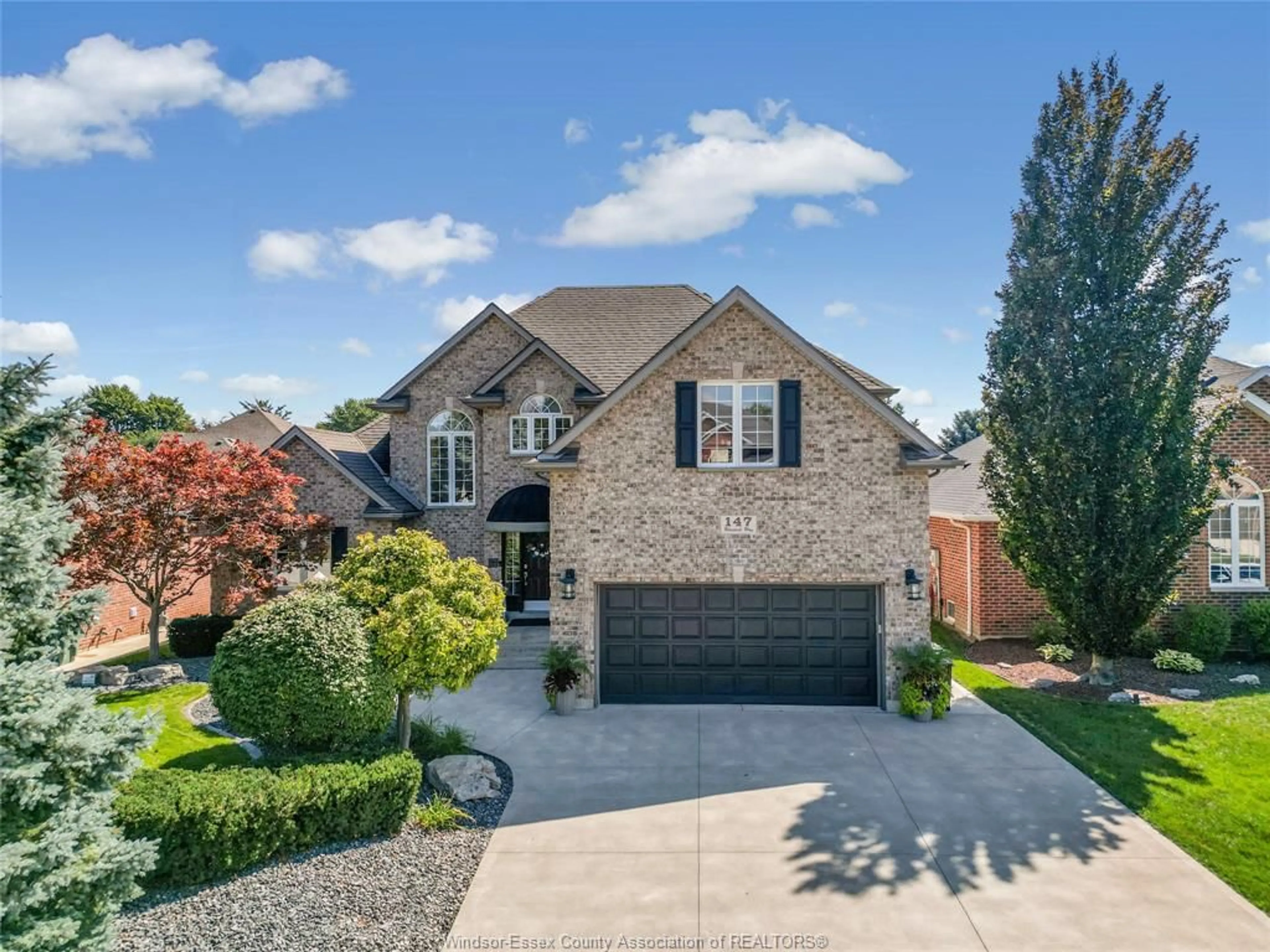 Home with brick exterior material, street for 147 Walstedt Way, Lakeshore Ontario N0R 1A0