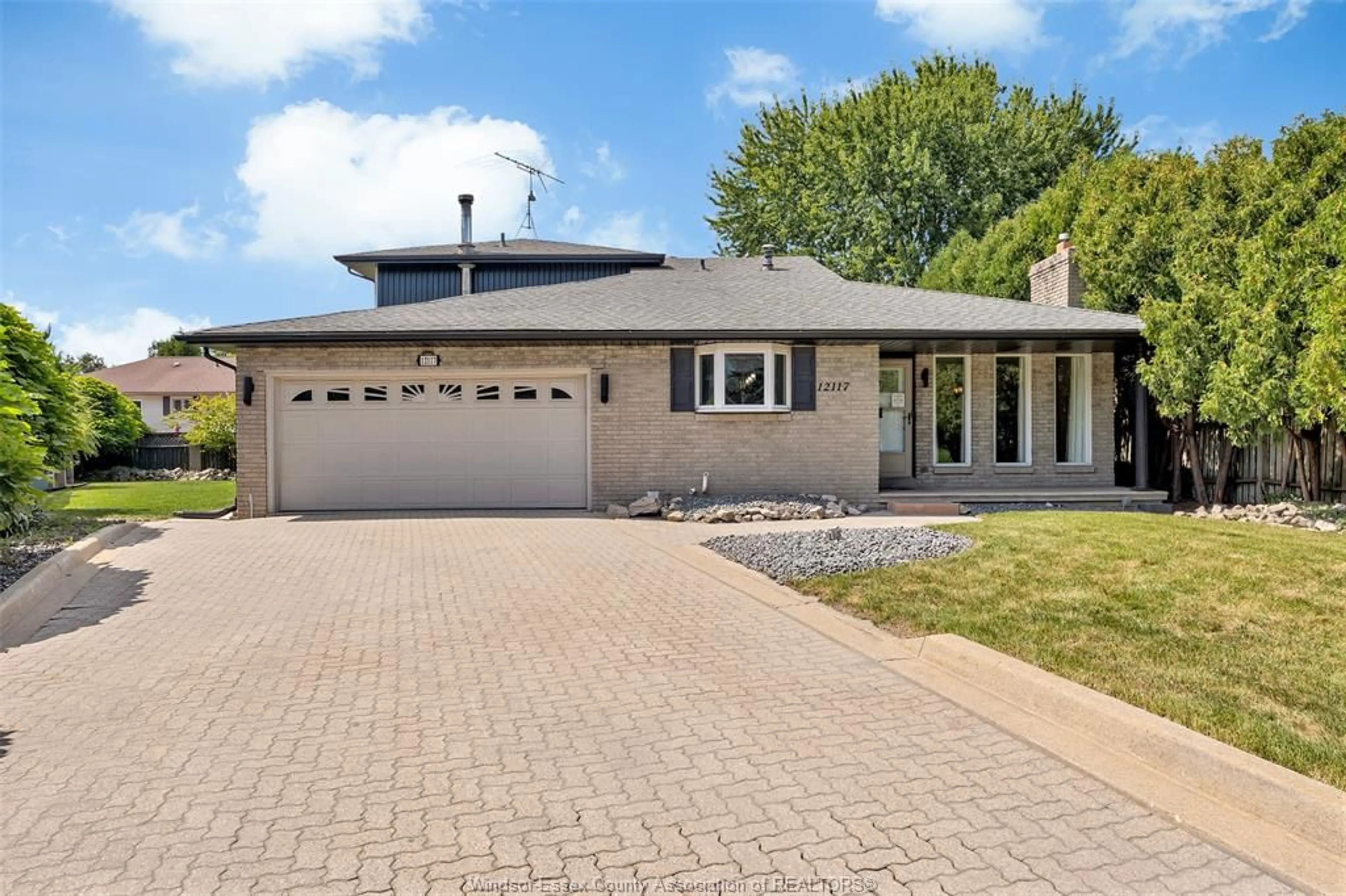 Home with brick exterior material, street for 12117 VALENTE Crt, Tecumseh Ontario N8N 3B9