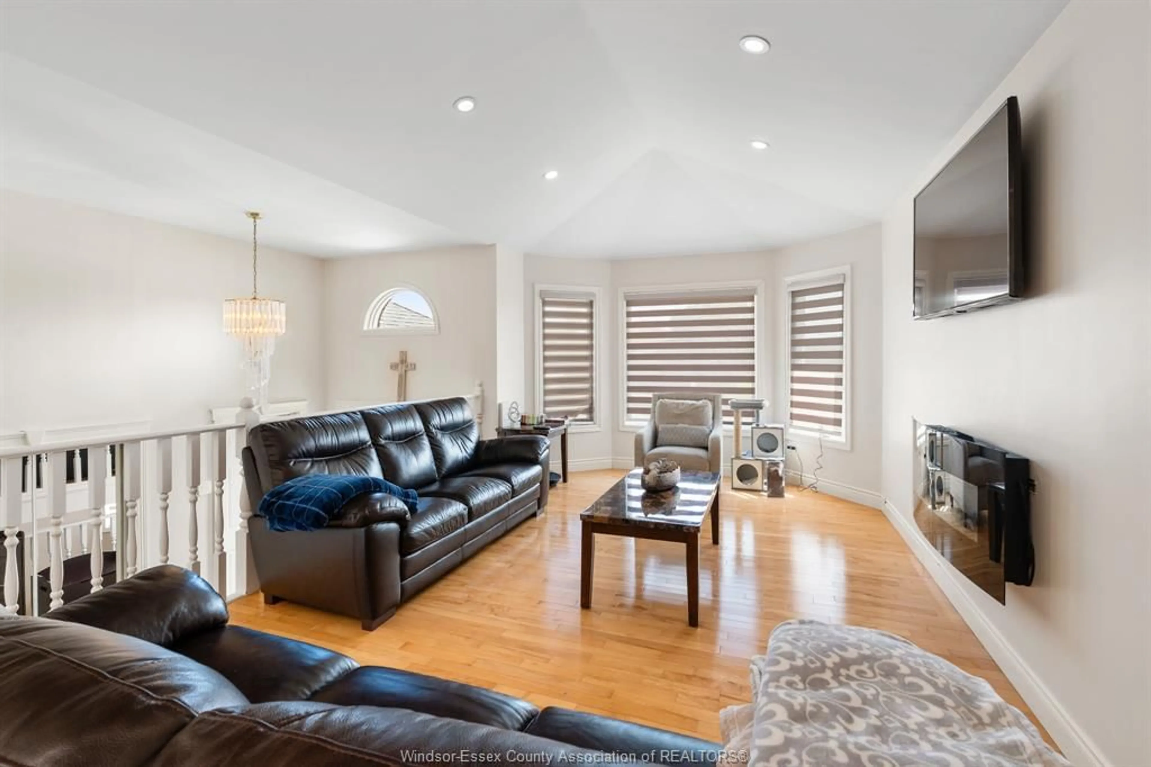 Living room with furniture, wood/laminate floor for 12465 LANOUE, Tecumseh Ontario N8N 1N4