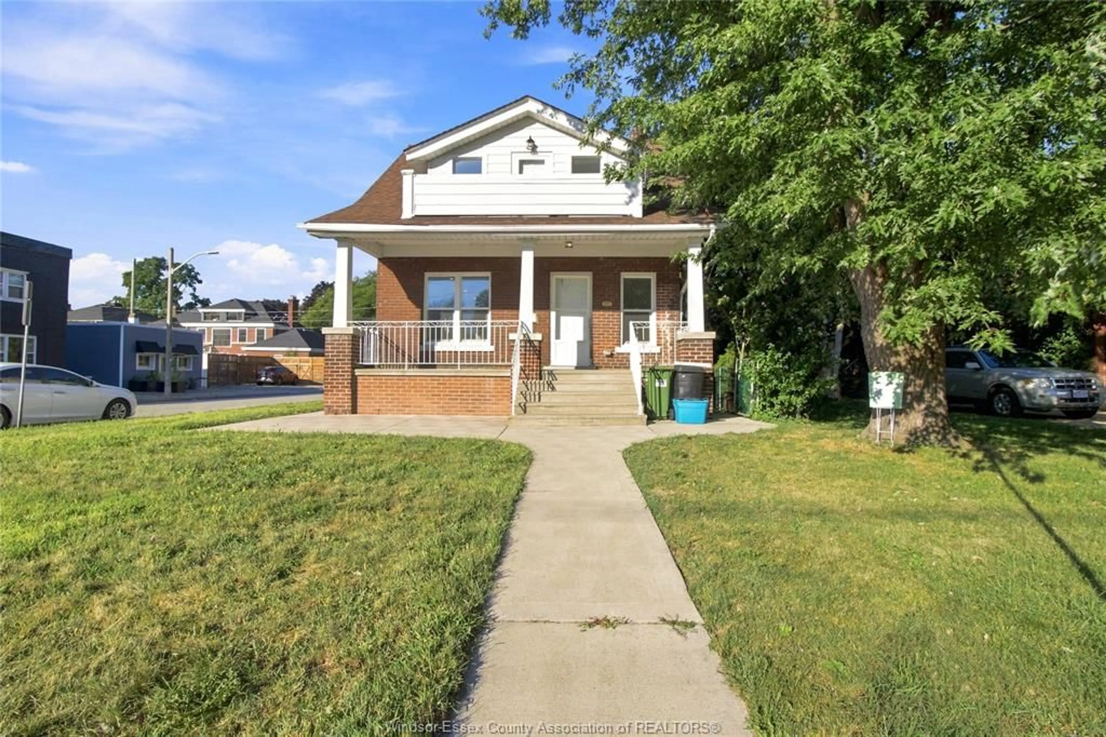 Home with brick exterior material, street for 1597 PELISSIER St, Windsor Ontario N8X 1M9