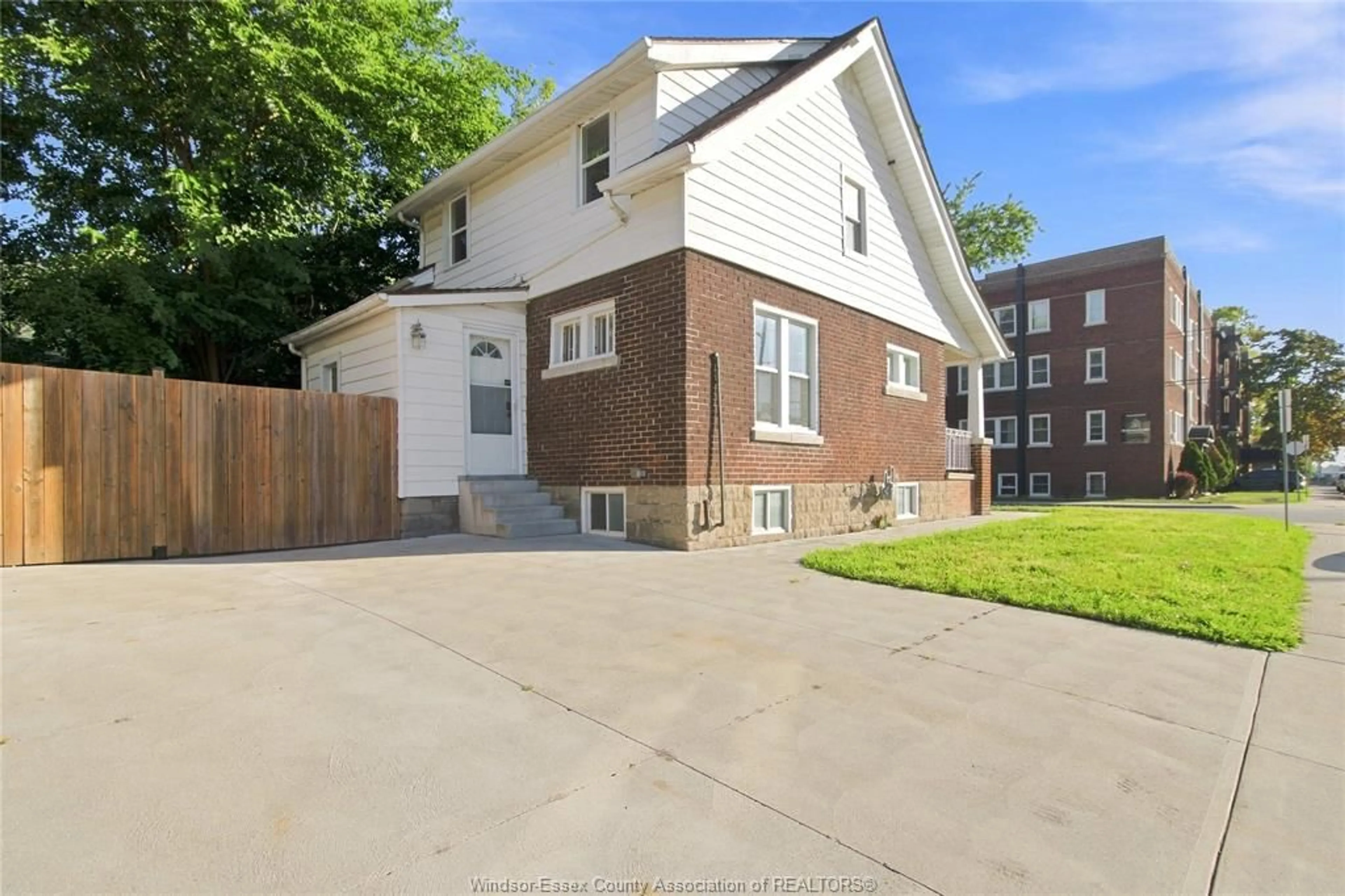 Home with brick exterior material, street for 1597 PELISSIER St, Windsor Ontario N8X 1M9