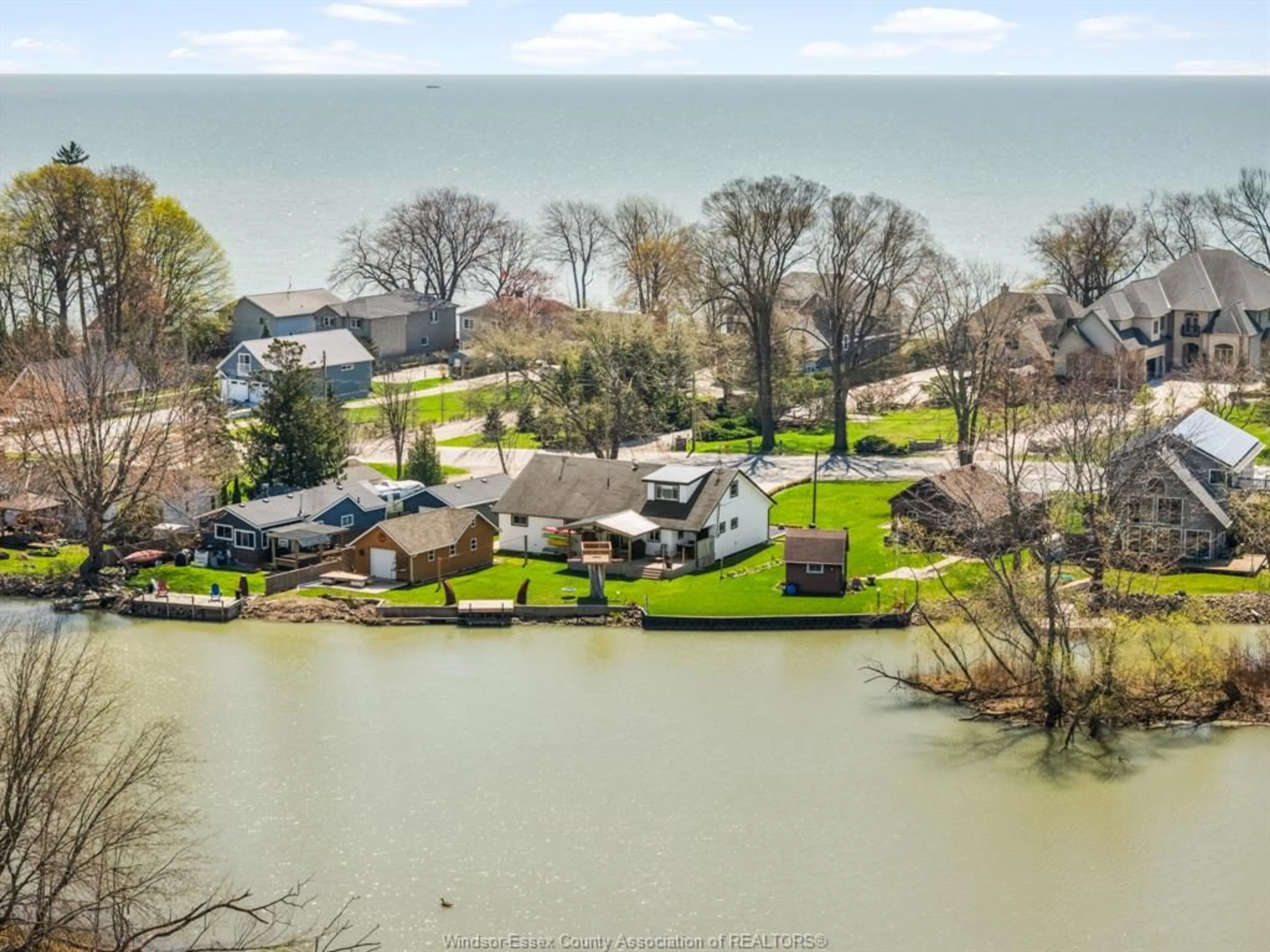 A pic from outside/outdoor area/front of a property/back of a property/a pic from drone, water/lake/river/ocean view for 1122 Heritage Rd, Kingsville Ontario N9Y 2E6