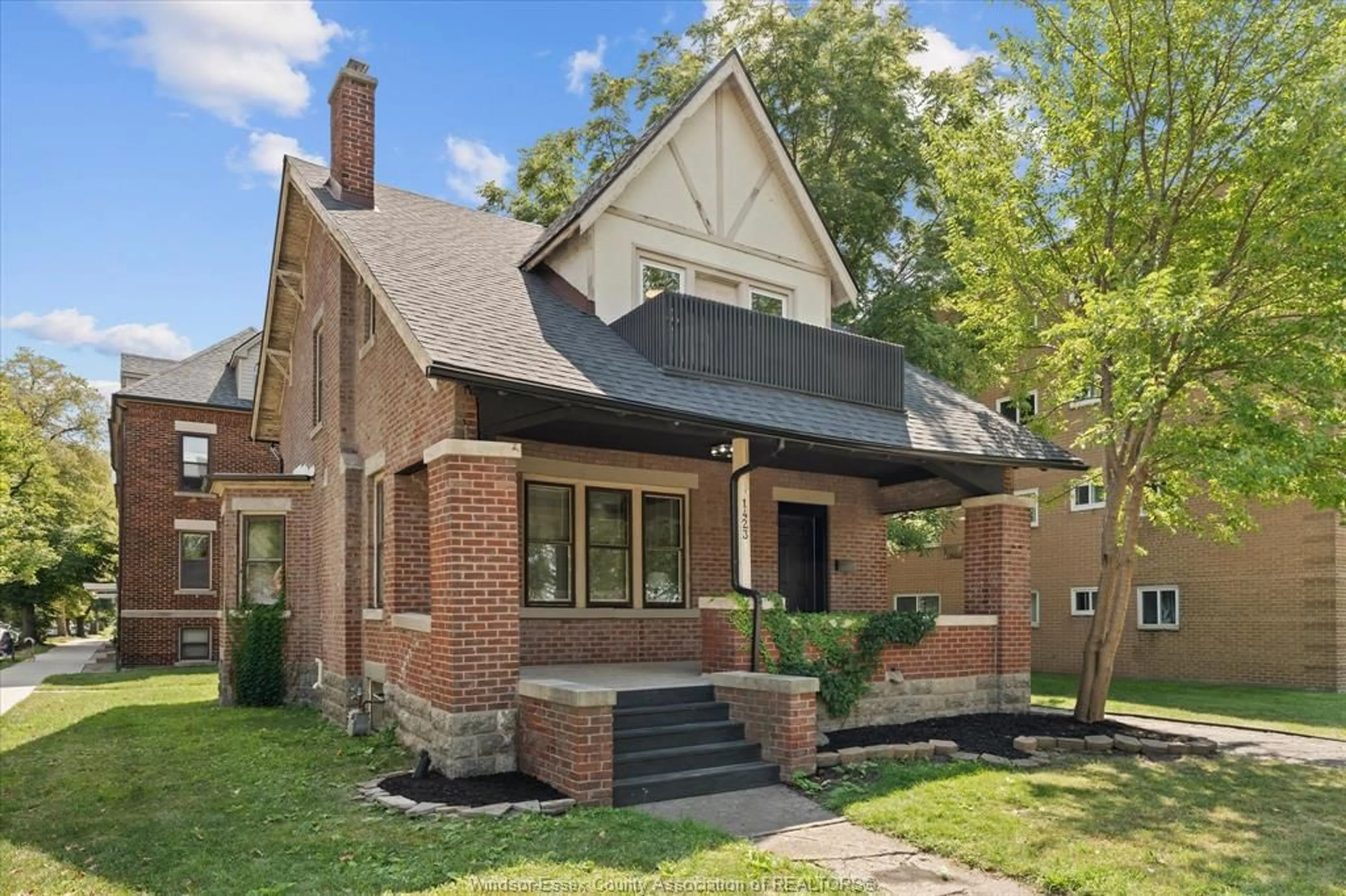 Home with brick exterior material, street for 1423 RIVERSIDE Dr, Windsor Ontario N9B 1A2