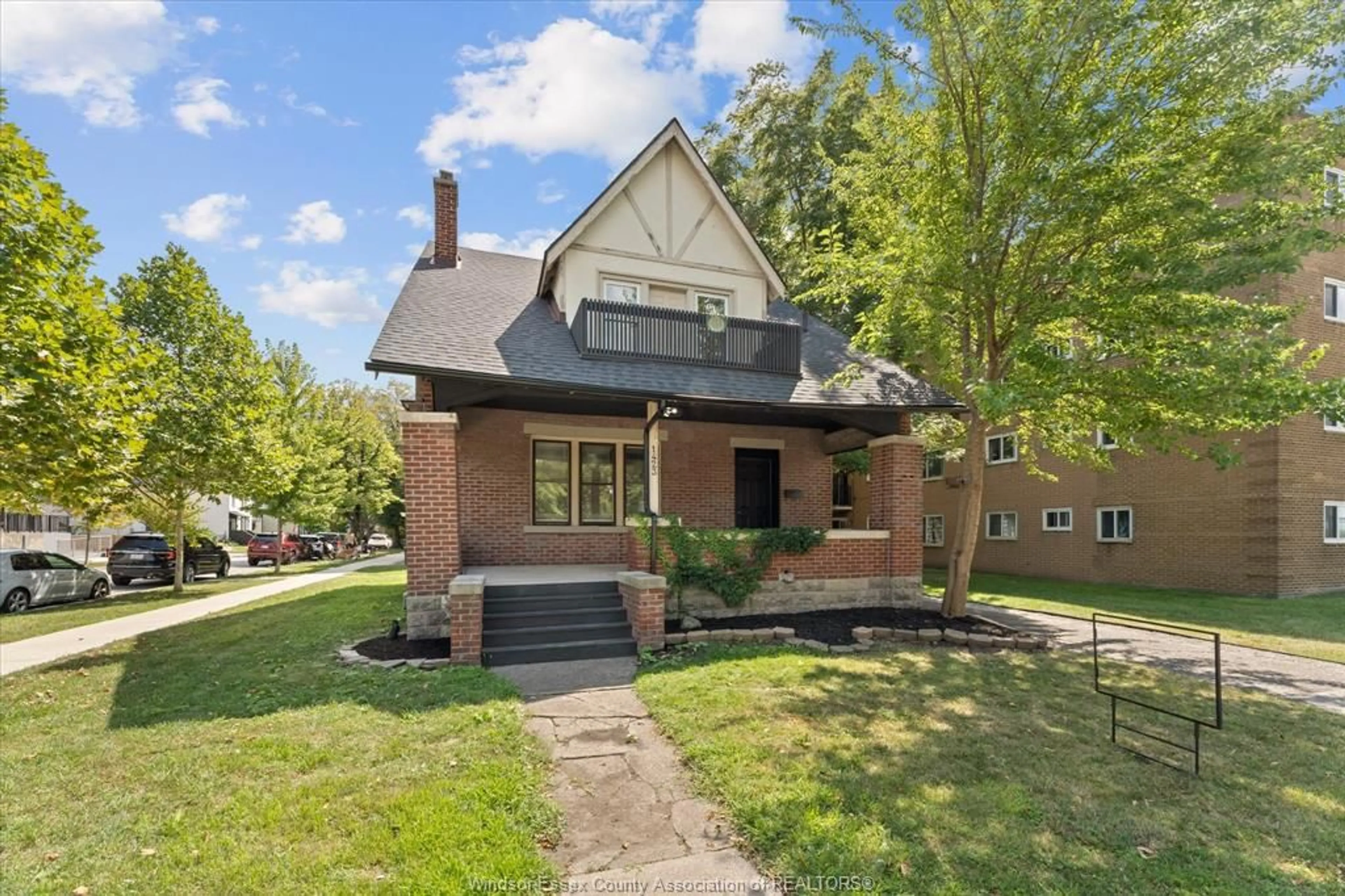 Home with brick exterior material, street for 1423 RIVERSIDE Dr, Windsor Ontario N9B 1A2