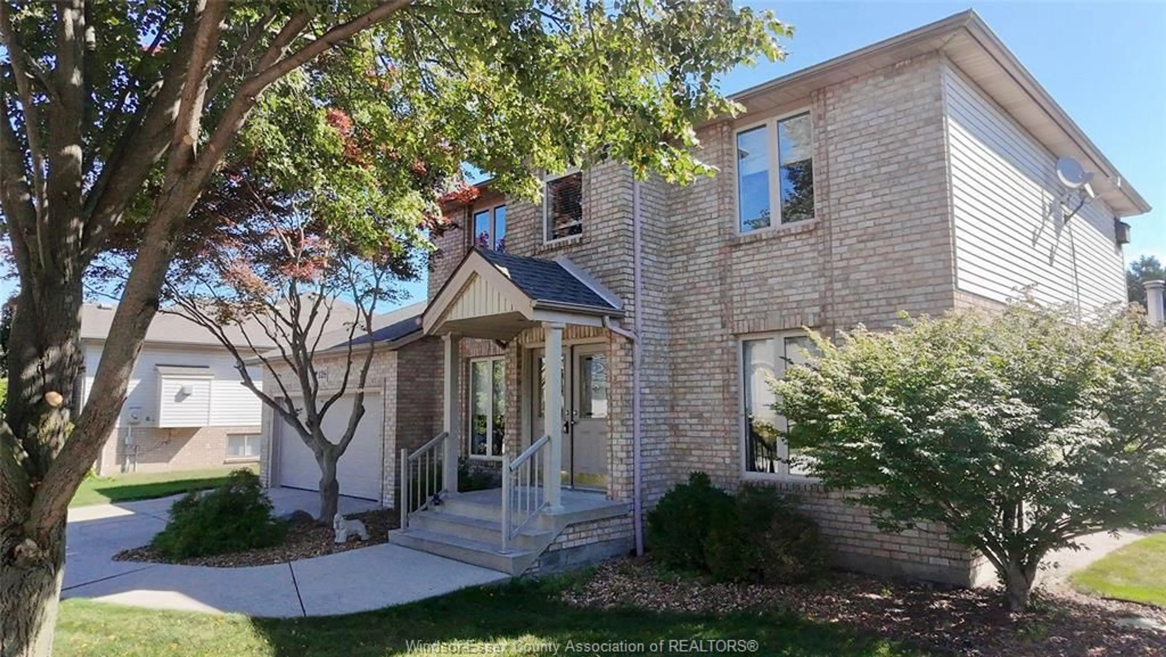 Home with brick exterior material, street for 128 Pheasant Run Dr, Lakeshore Ontario N8L 0Z7
