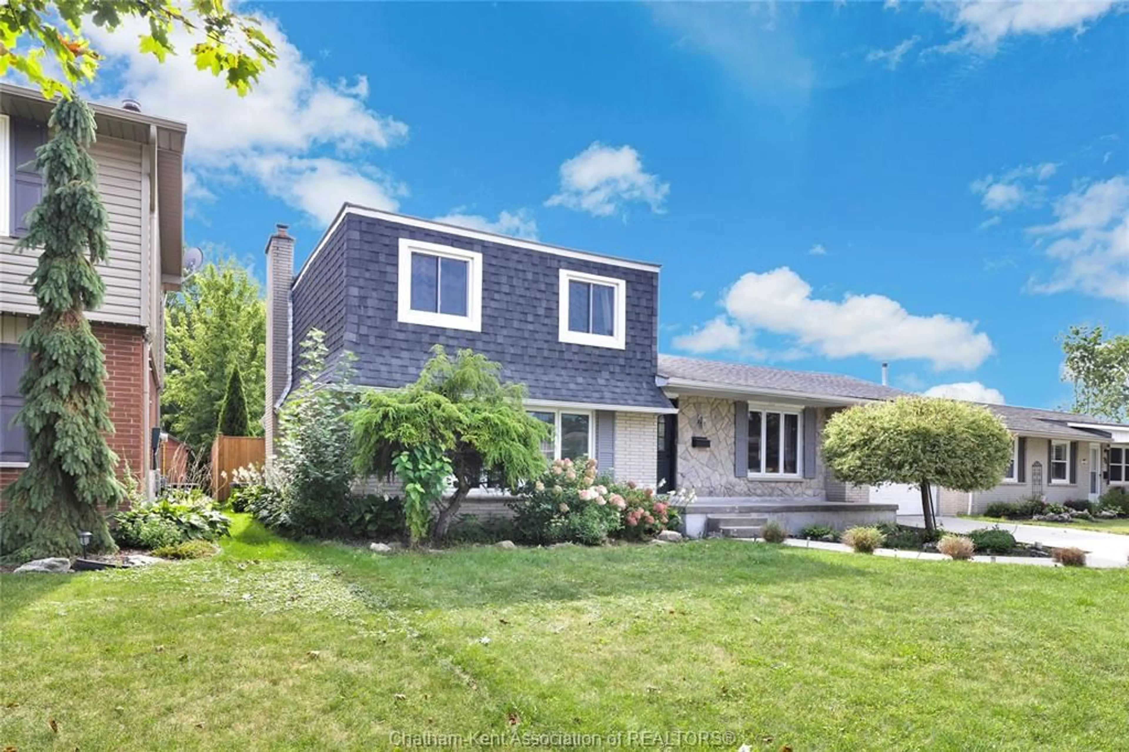 Home with brick exterior material, street for 71 Parry Dr, Chatham Ontario N7L 2J1