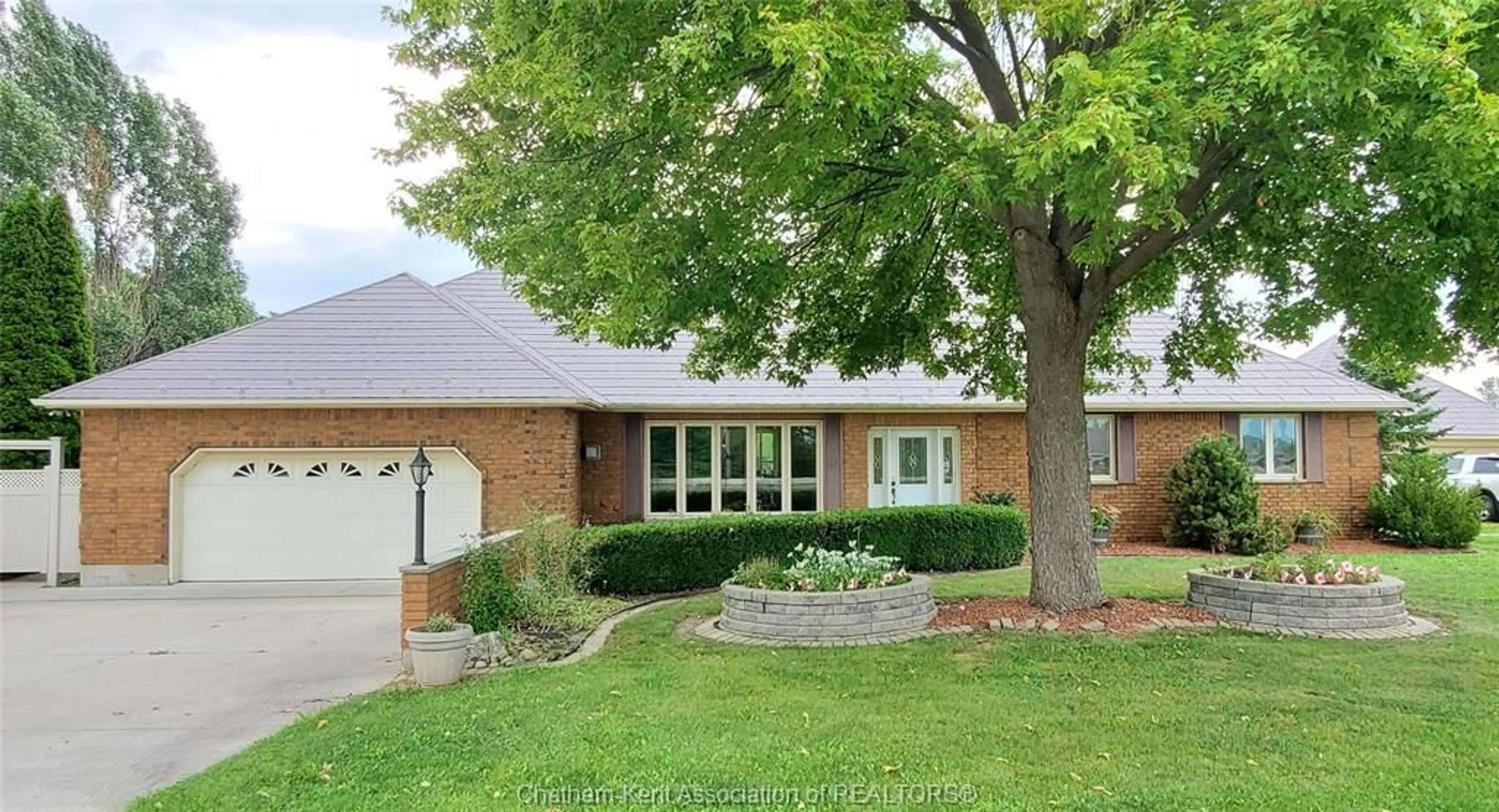 Home with brick exterior material, street for 8560 Talbot Trail, Cedar Springs Ontario N0P 1E0