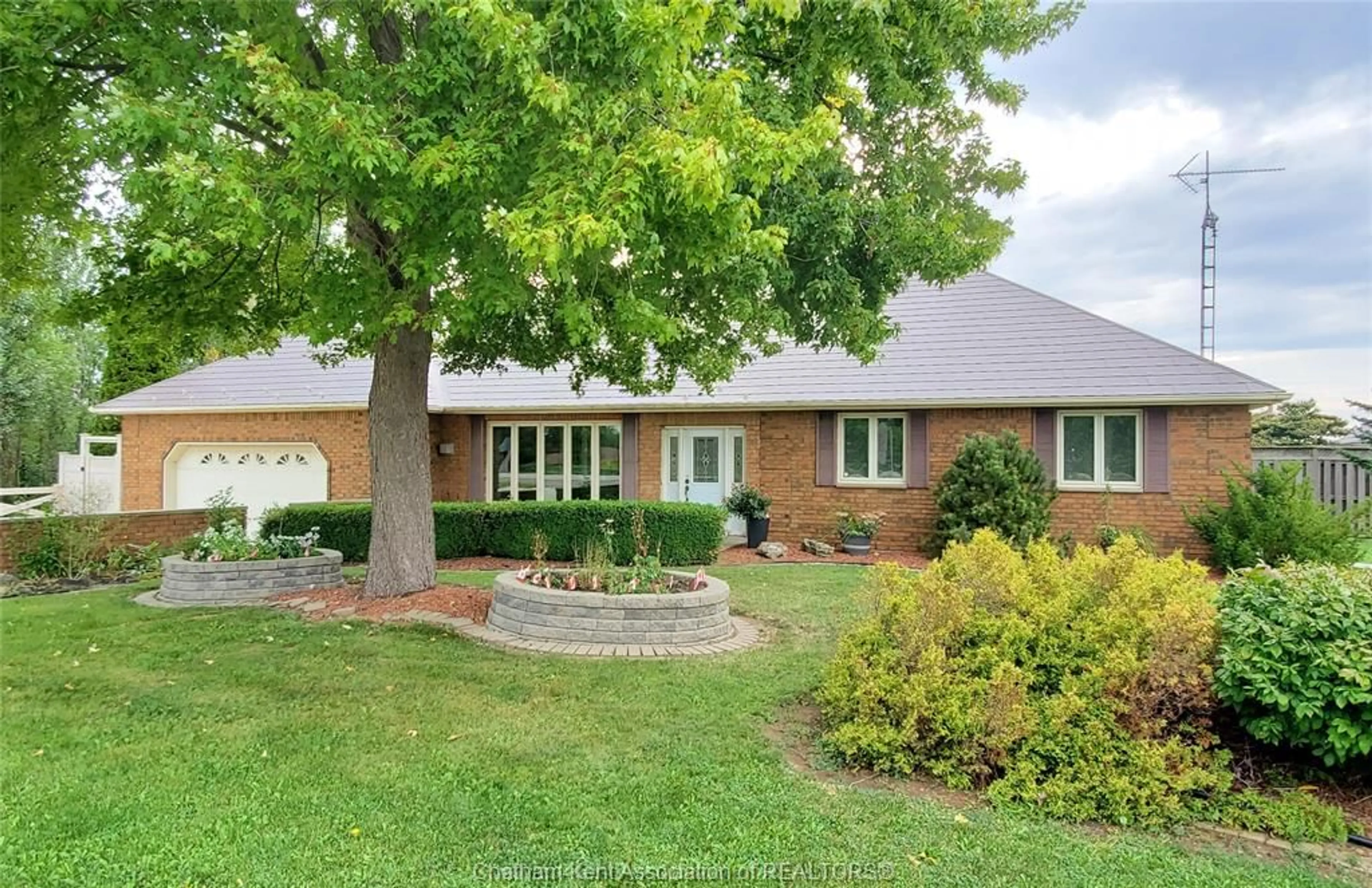 Home with brick exterior material, street for 8560 Talbot Trail, Cedar Springs Ontario N0P 1E0