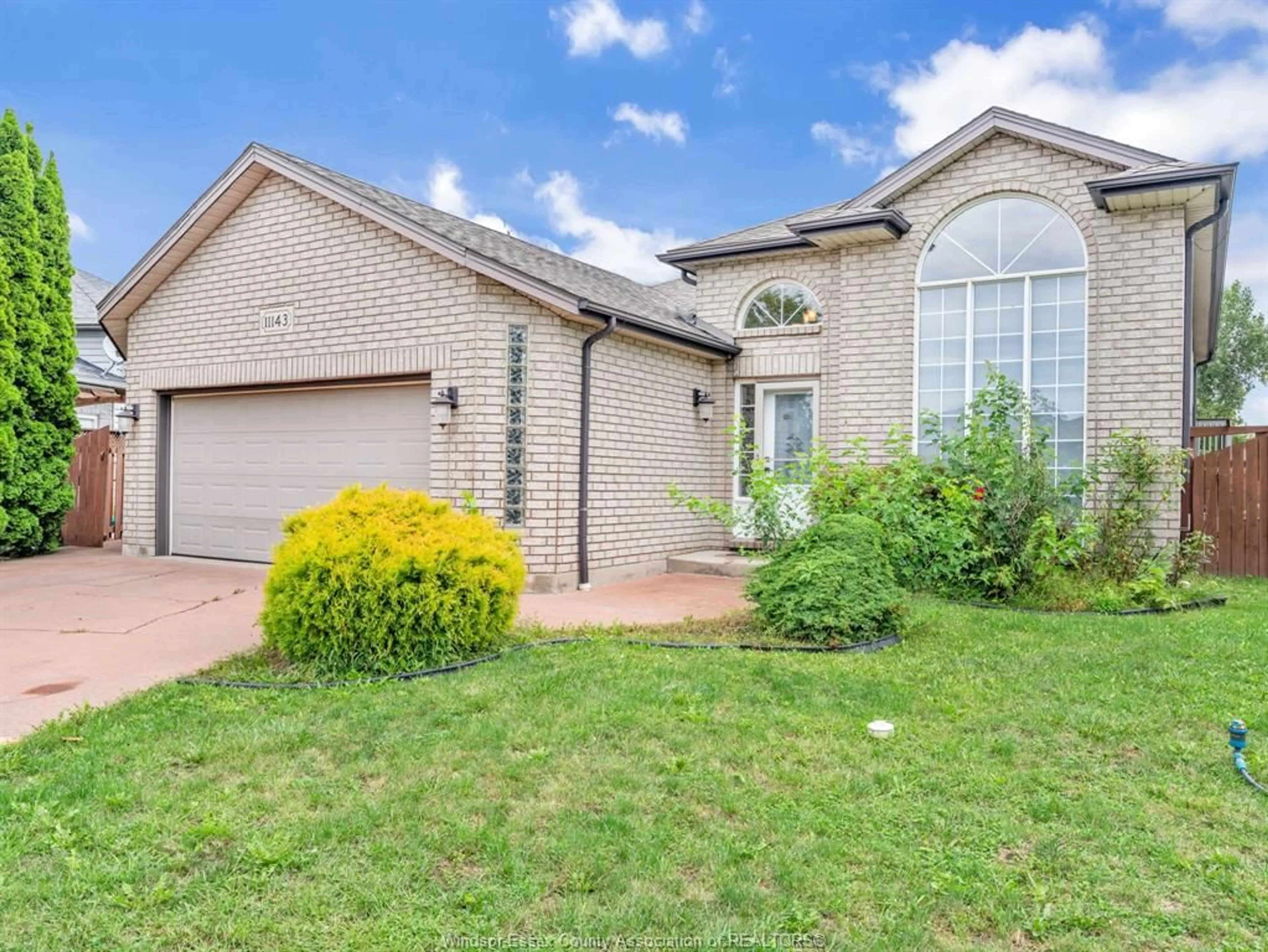 Home with brick exterior material, street for 11143 ANCONA Cres, Windsor Ontario N8R 2K2