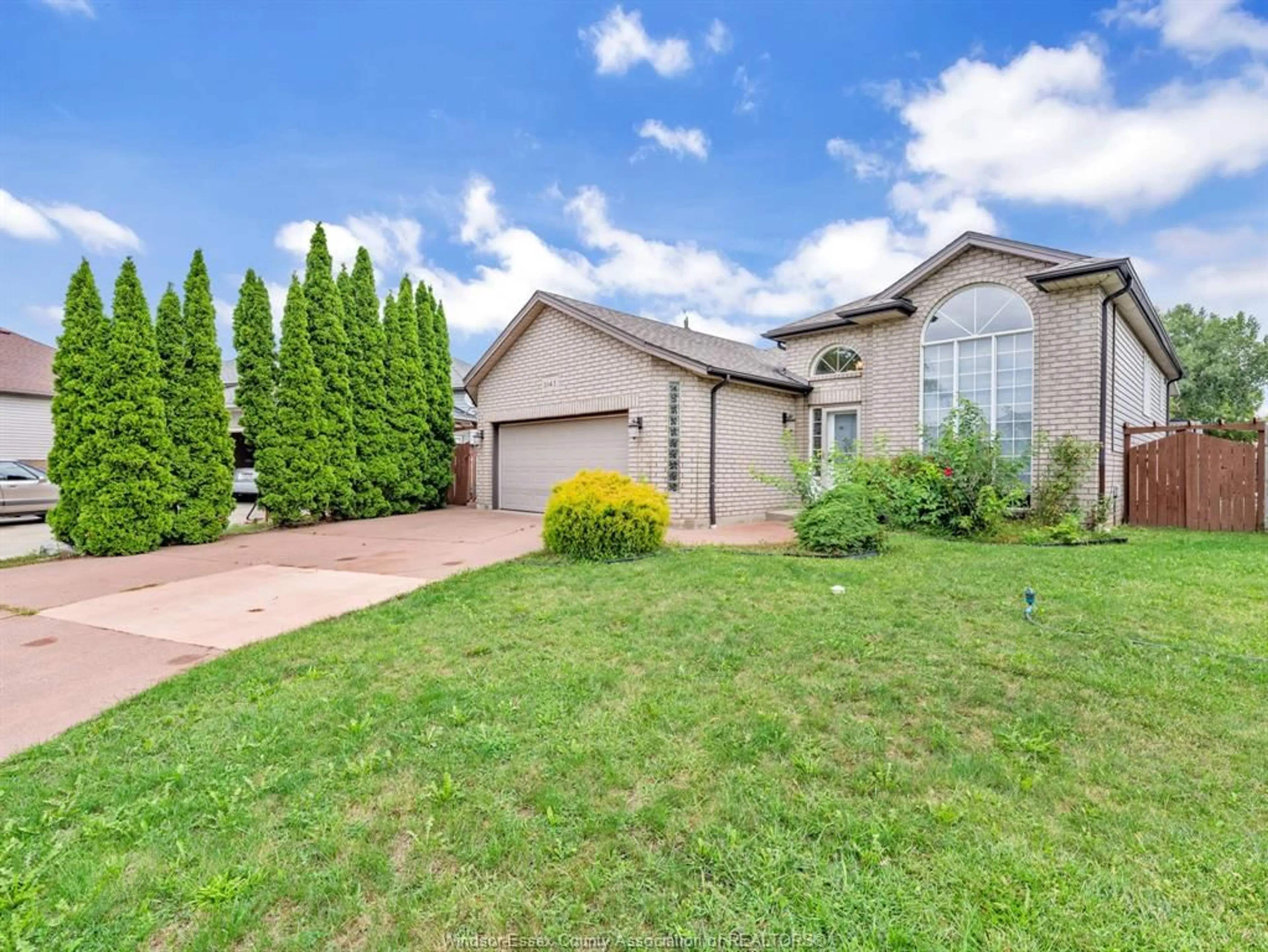A pic from outside/outdoor area/front of a property/back of a property/a pic from drone, street for 11143 ANCONA Cres, Windsor Ontario N8R 2K2