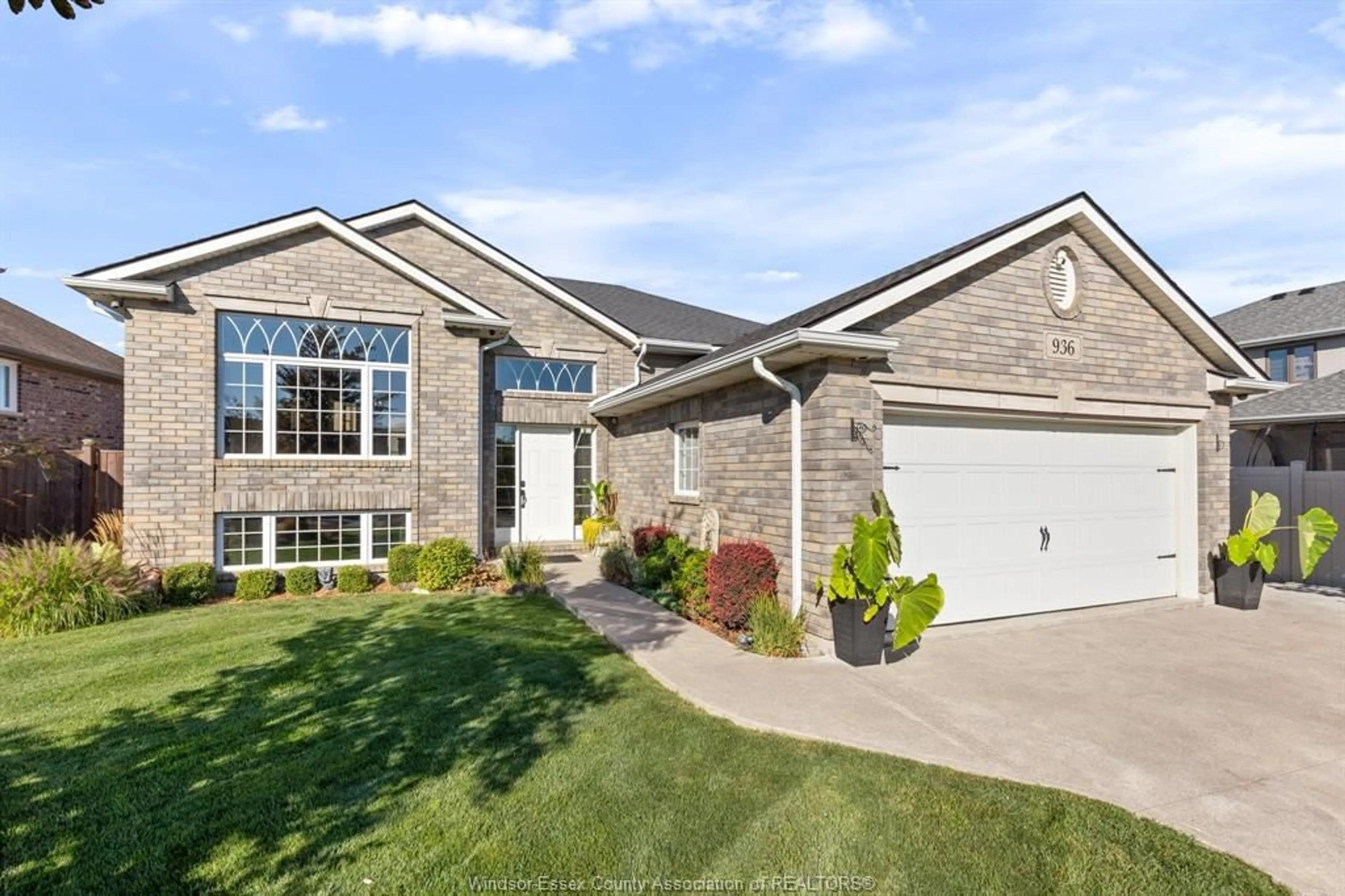 Home with brick exterior material, street for 936 DRIFTWOOD, Lakeshore Ontario N0R 1A0
