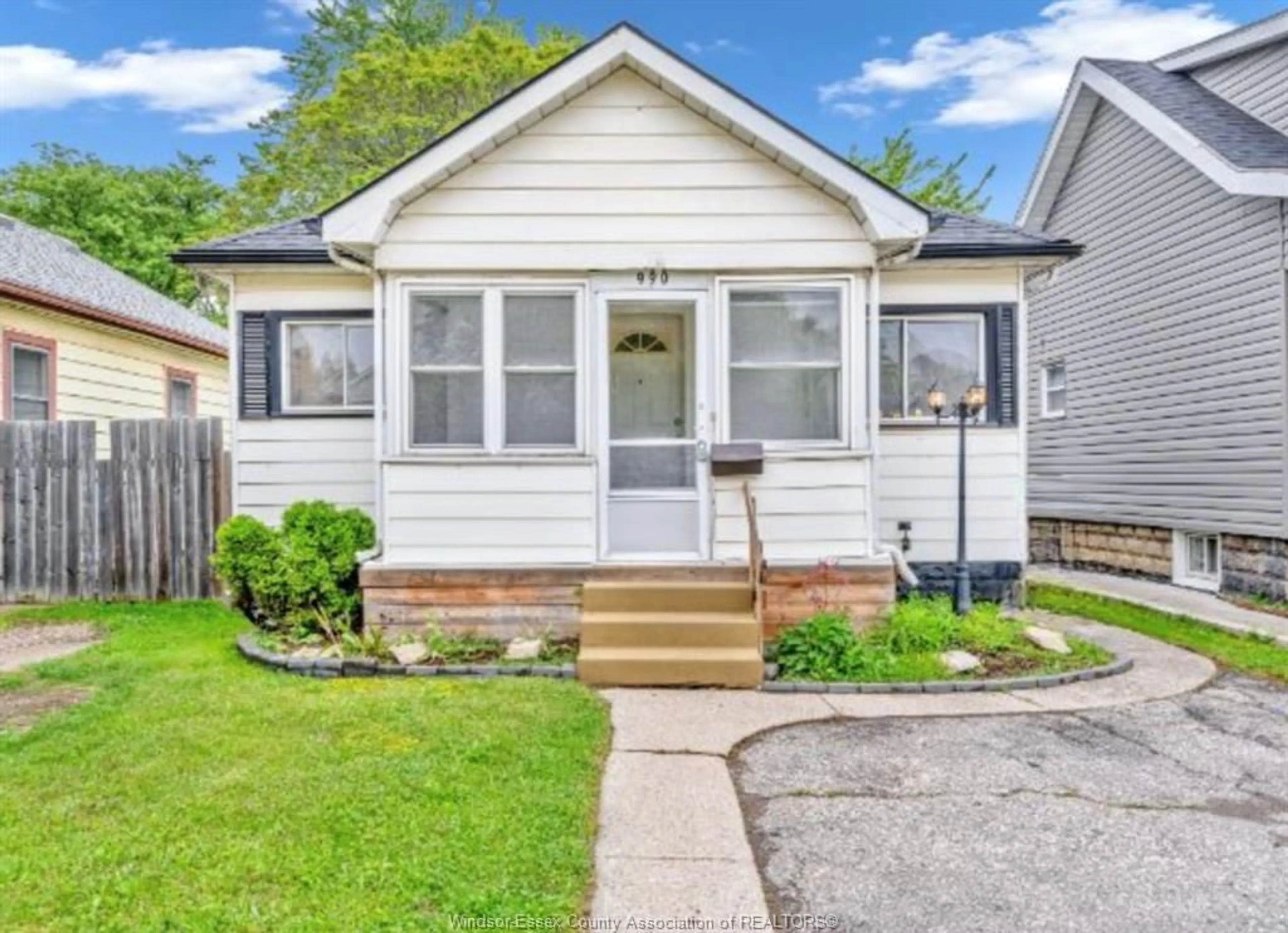 Home with vinyl exterior material, street for 990 Campbell Ave, Windsor Ontario N9B 2J2