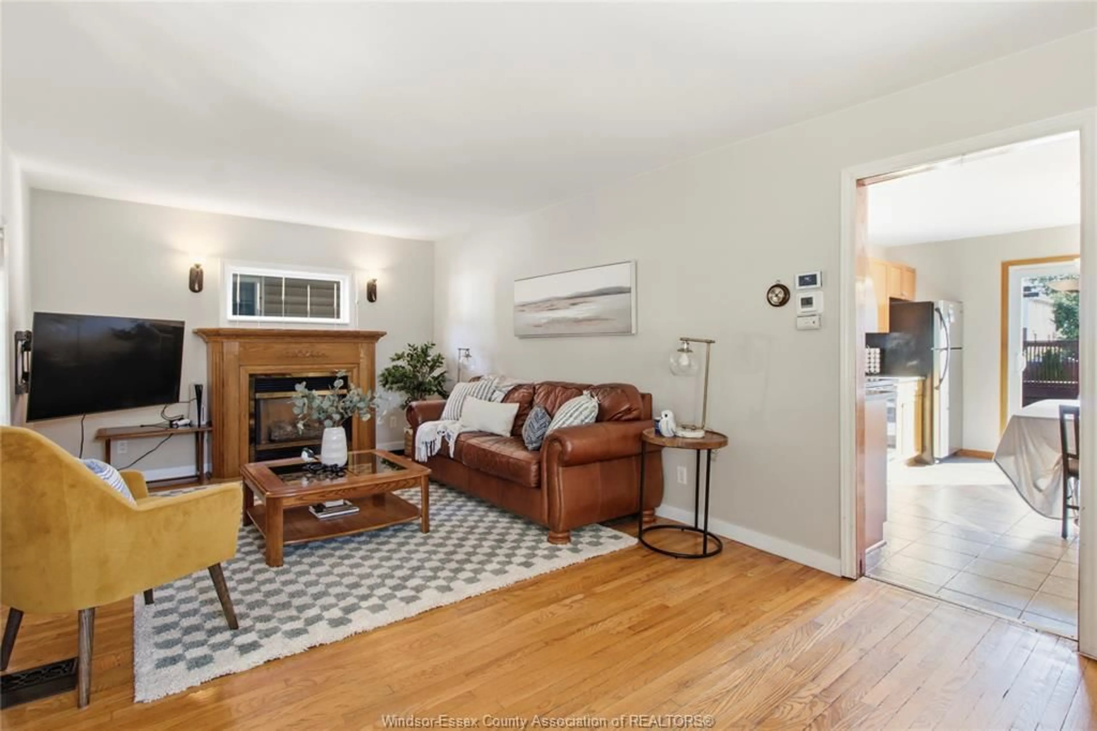 Living room with furniture, wood/laminate floor for 1776 HALL, Windsor Ontario N8W 2L4